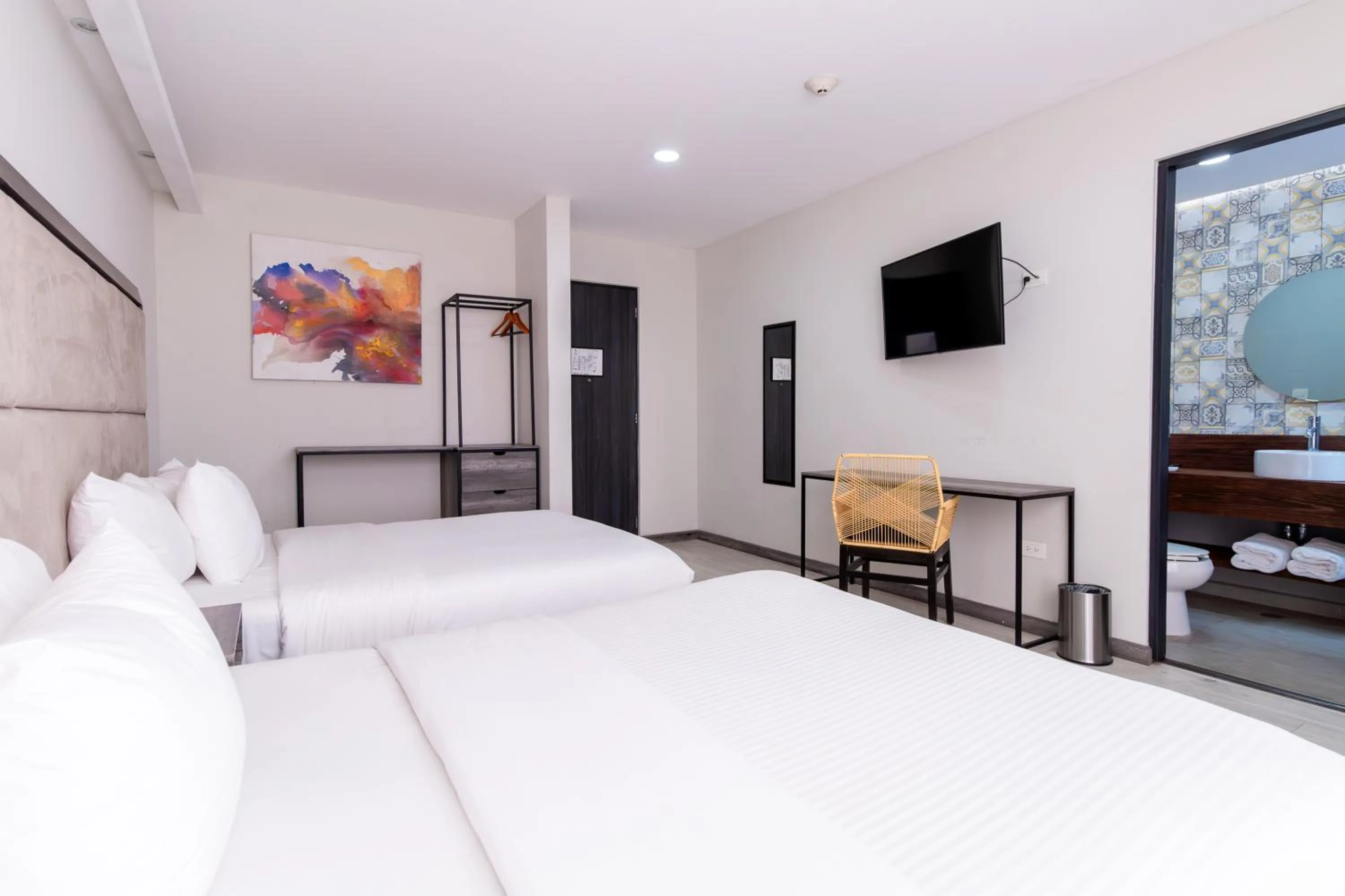 Bed in Arkana Puebla by Grupo Amber