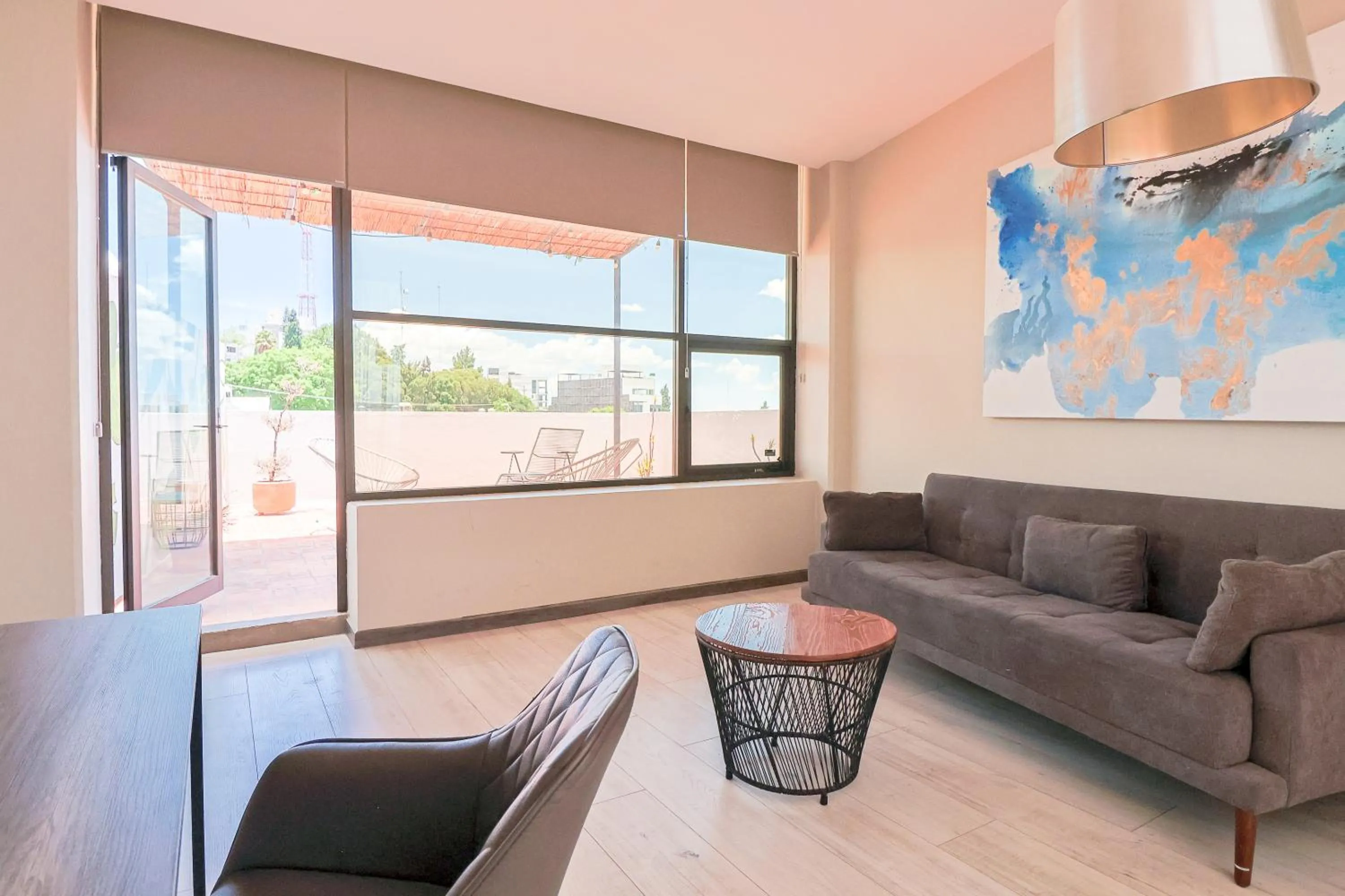 Seating area in Arkana Puebla by Grupo Amber