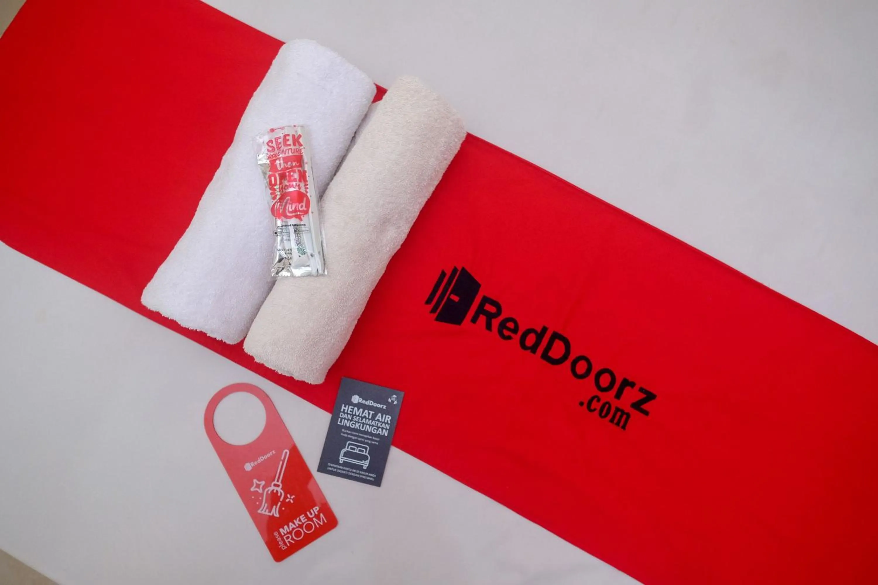 Property logo or sign in RedDoorz near Jalan Wolter Monginsidi Manado