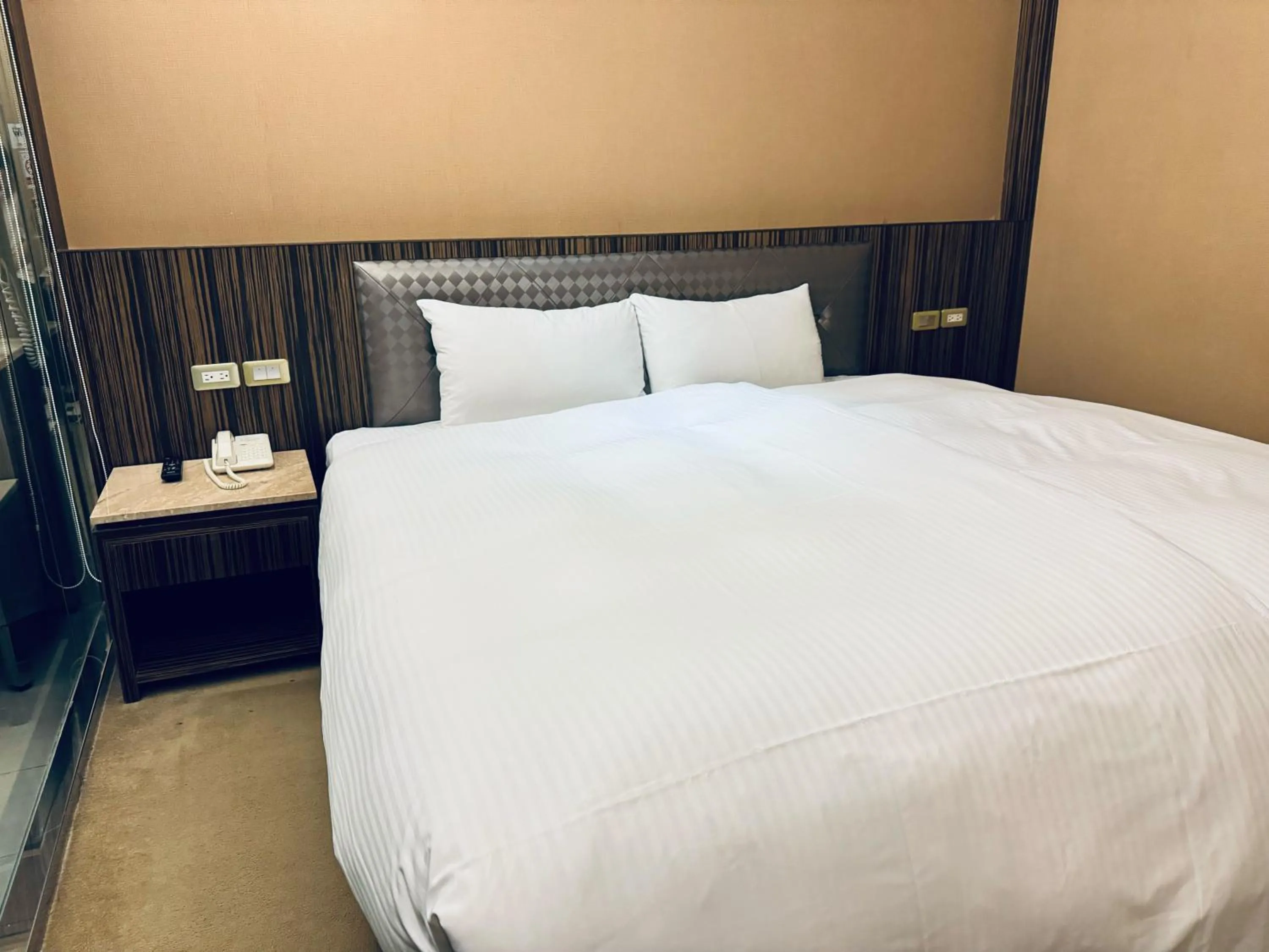 Bed in 友愛京賞國際大飯店 Yoai Jing Shang Hotel