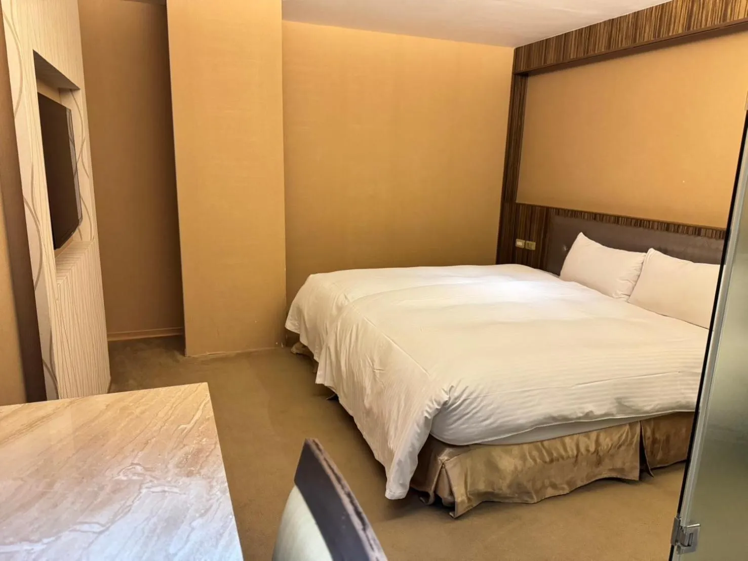 Bed in 友愛京賞國際大飯店 Yoai Jing Shang Hotel