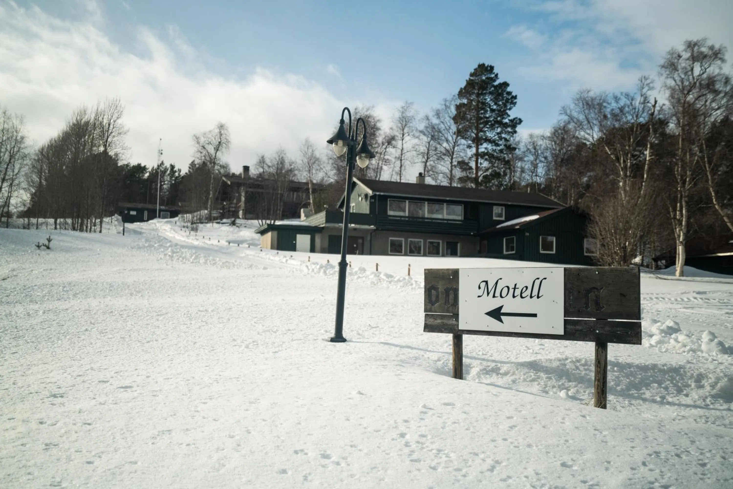Property logo or sign in Dombåstun Motel