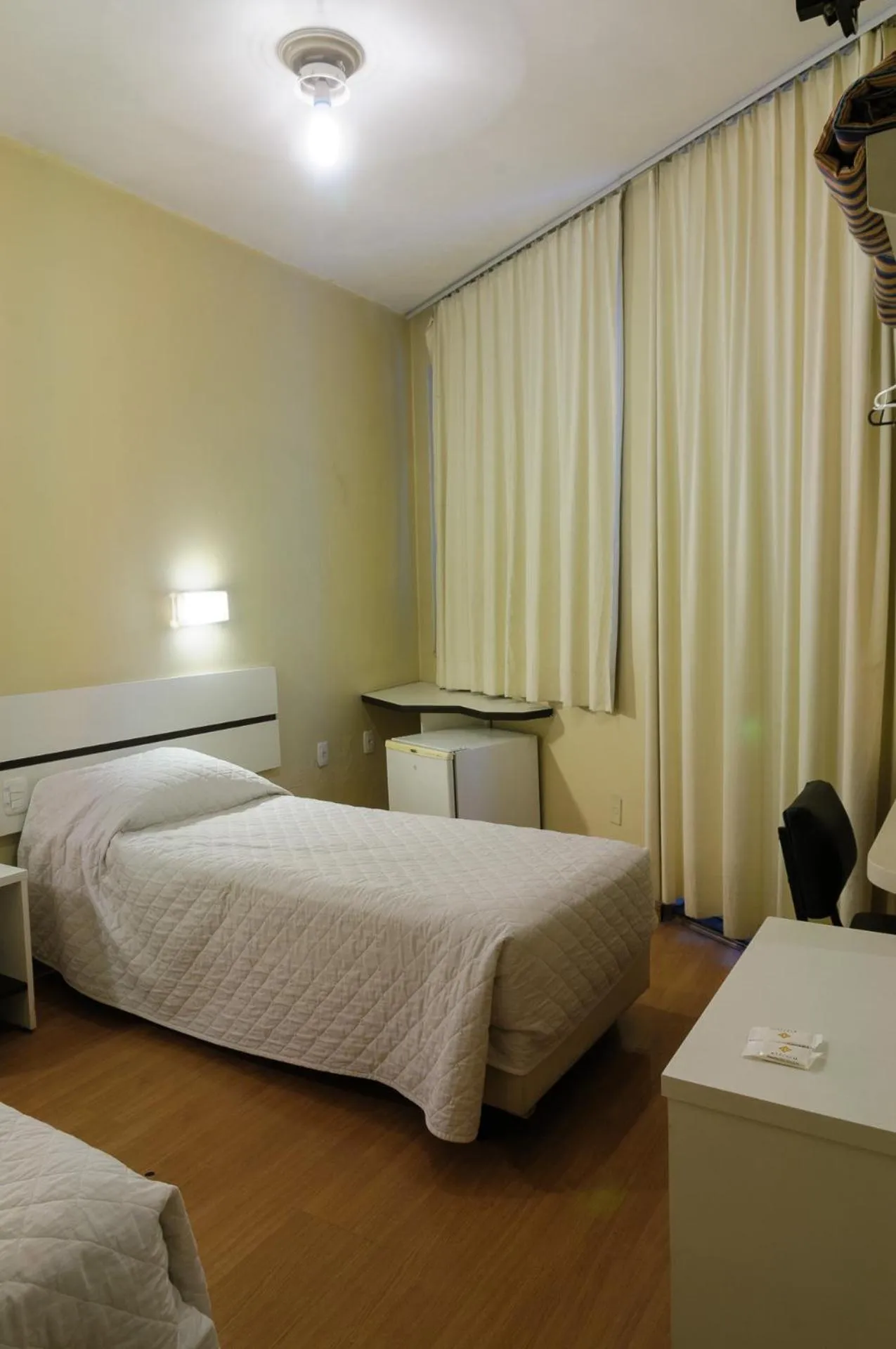 Bed in Hotel Elevado