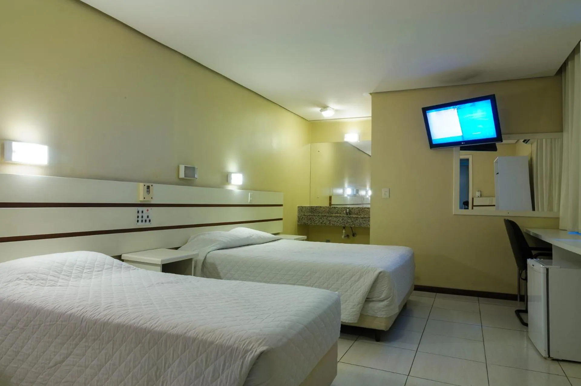 Bed in Hotel Elevado