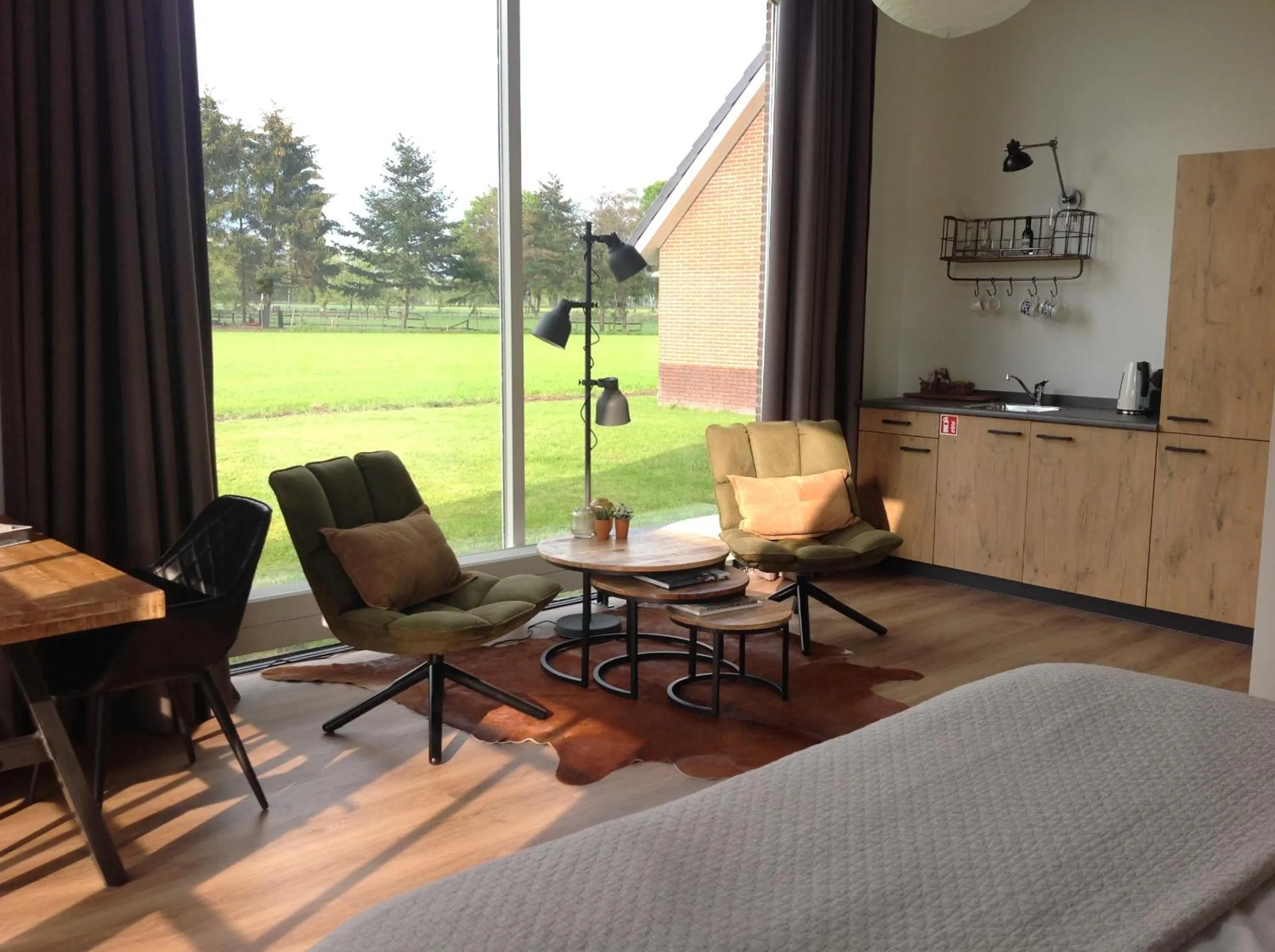 Seating area in B&B De Veluwe Hoeve