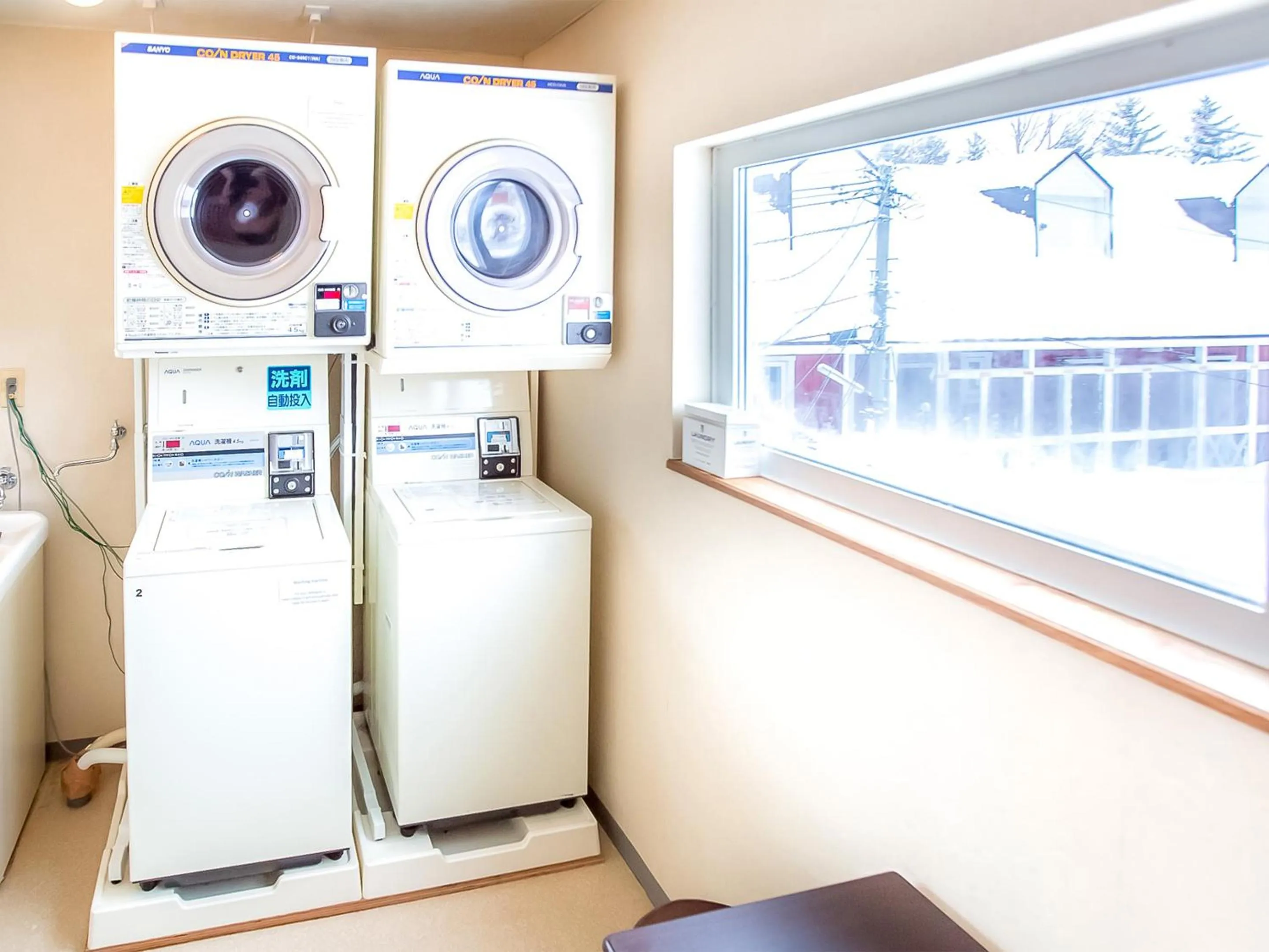 washing machine in Rusutsu Lodges Pension Lilla Huset