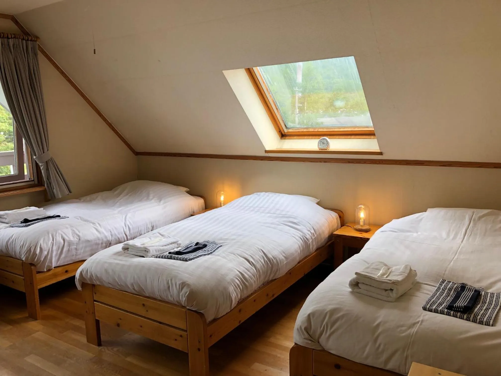 Photo of the whole room, Bed in Rusutsu Lodges Pension Lilla Huset