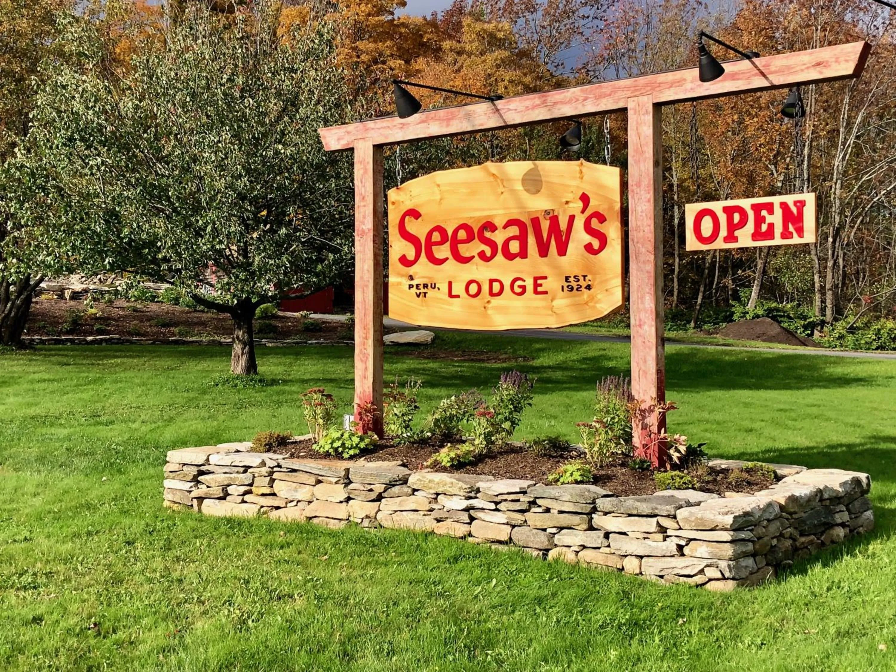 Property logo or sign in Seesaw's Lodge