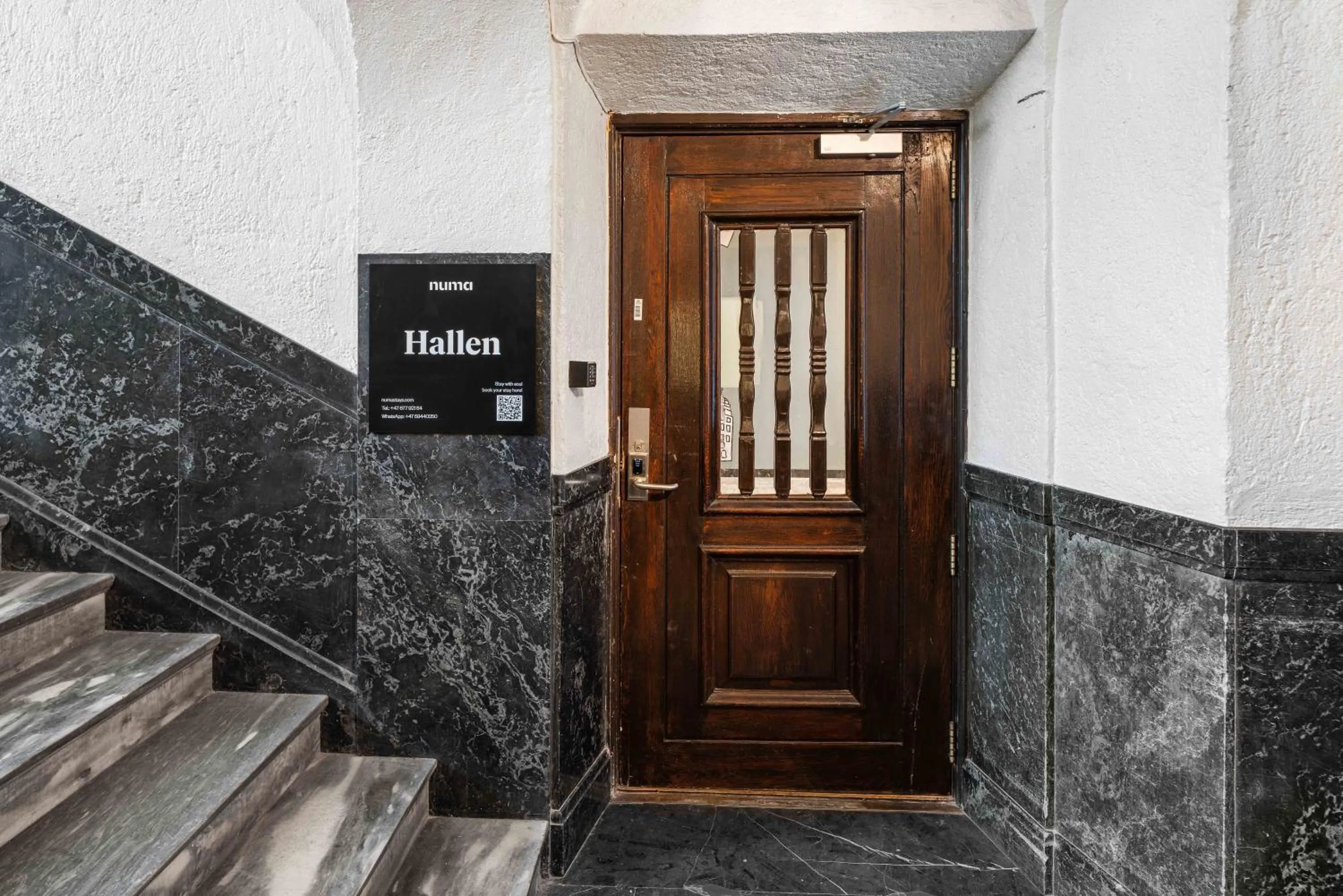 Property logo or sign in Numa I Hallen Apartments