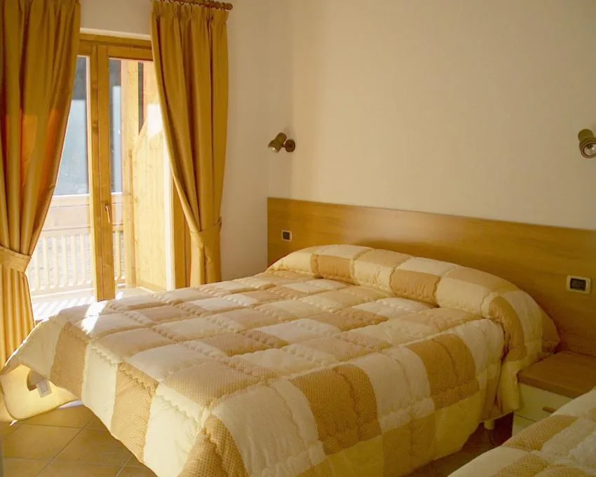 Bed in Baita dei Pini