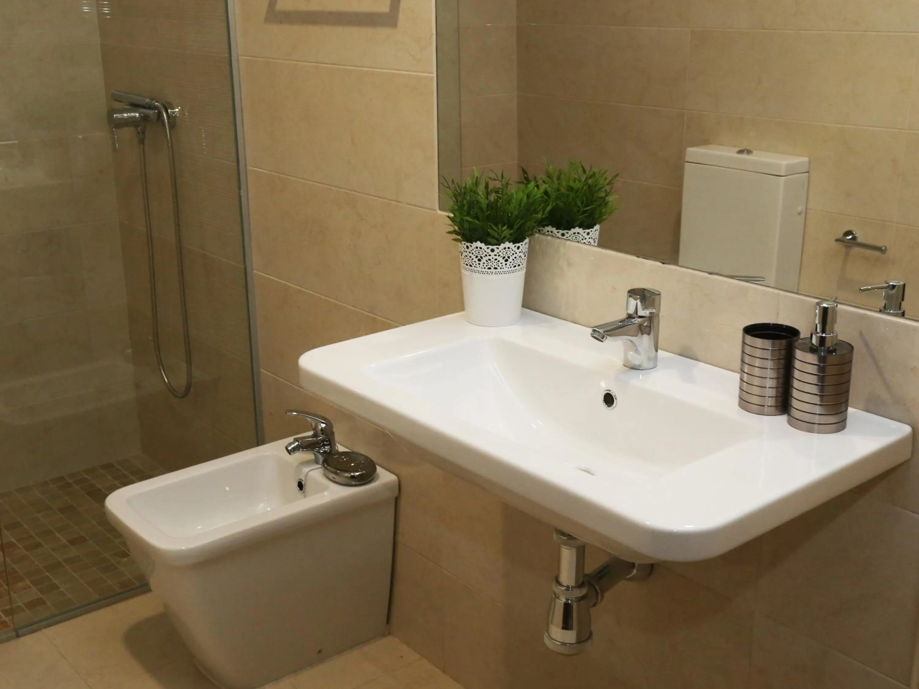 Shower in Apartamento turisticos Puente Romano P3 2-A