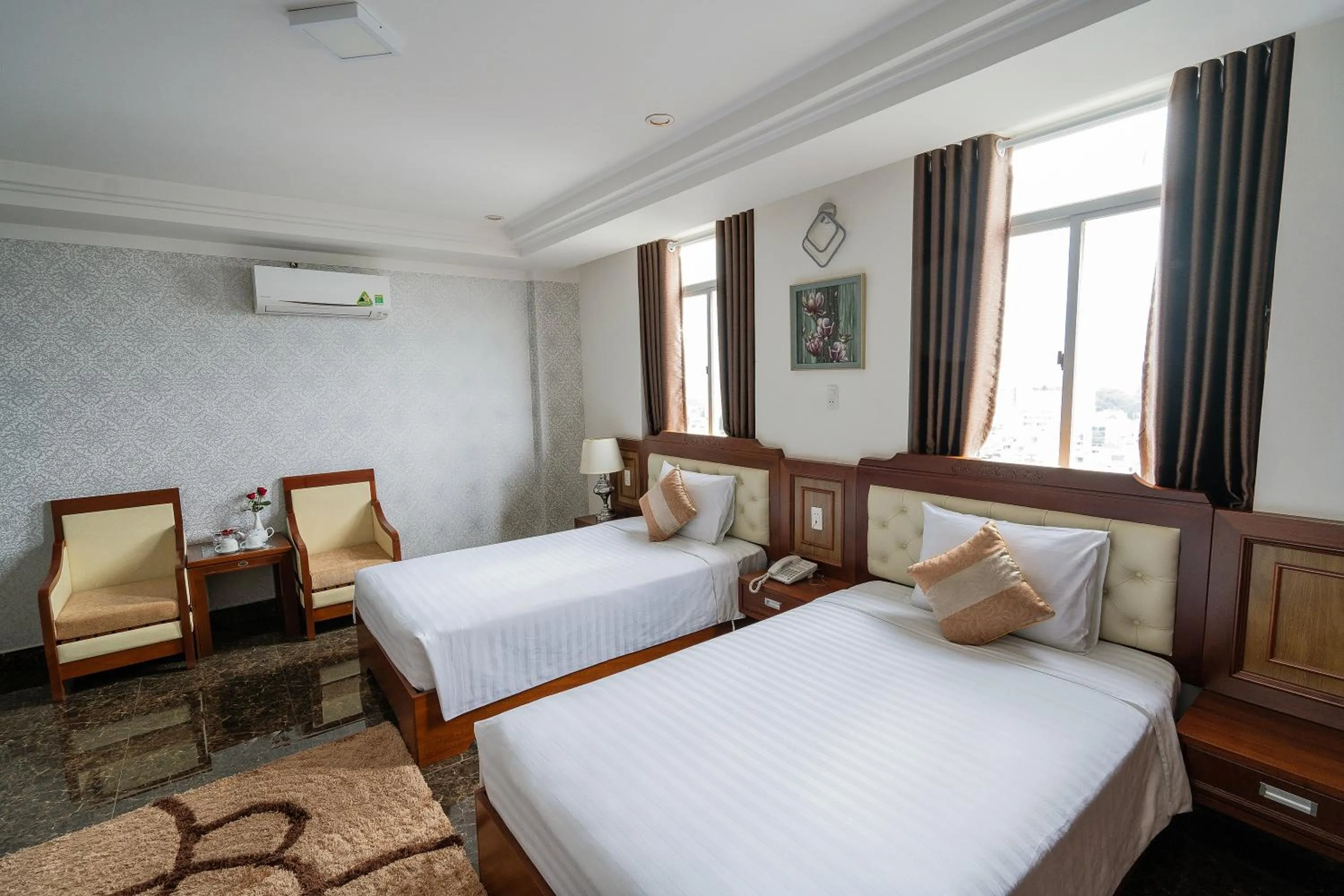 Bed in Duc Long Gia Lai Hotels & Apartment