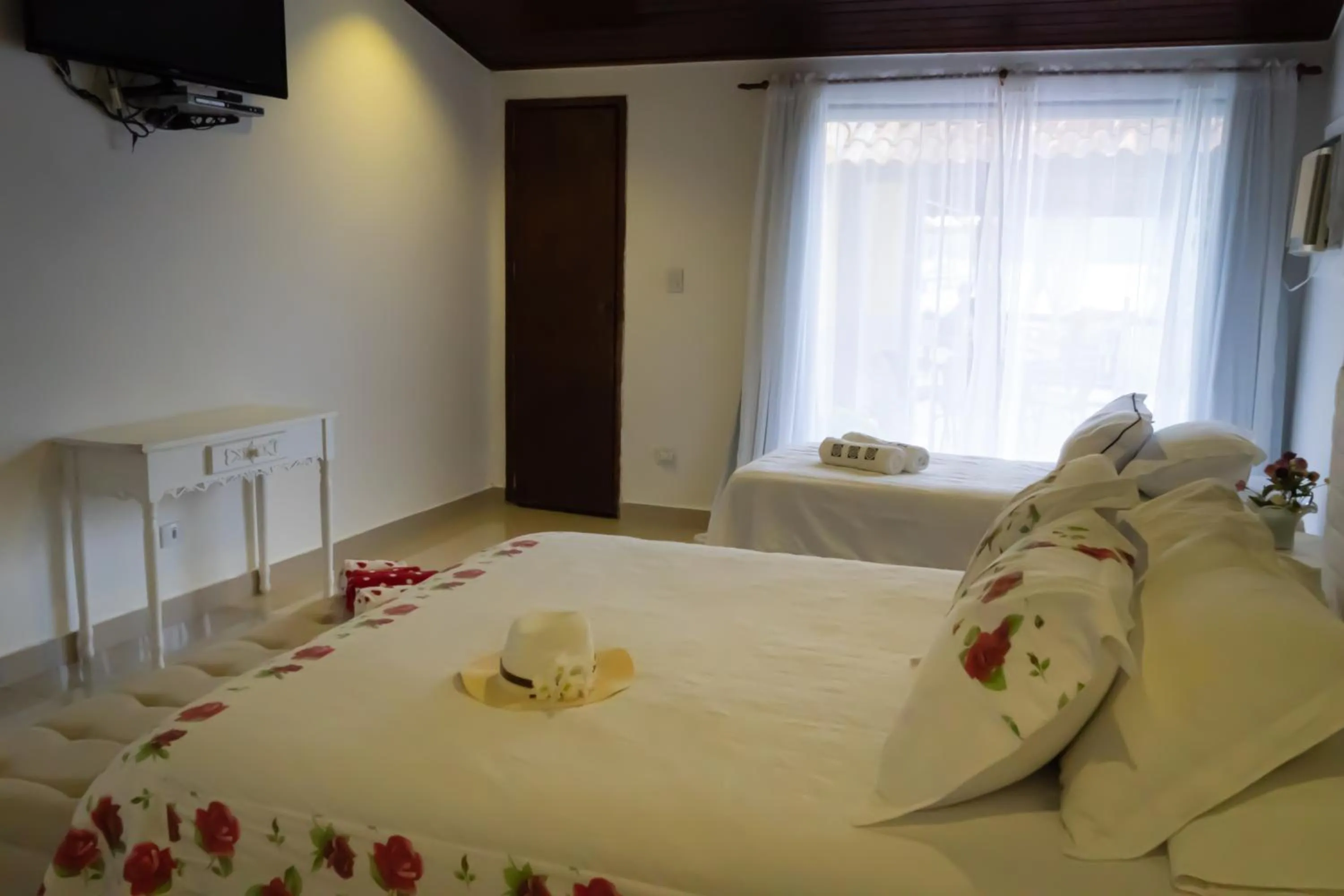 Bed in Pousada Gata Russa