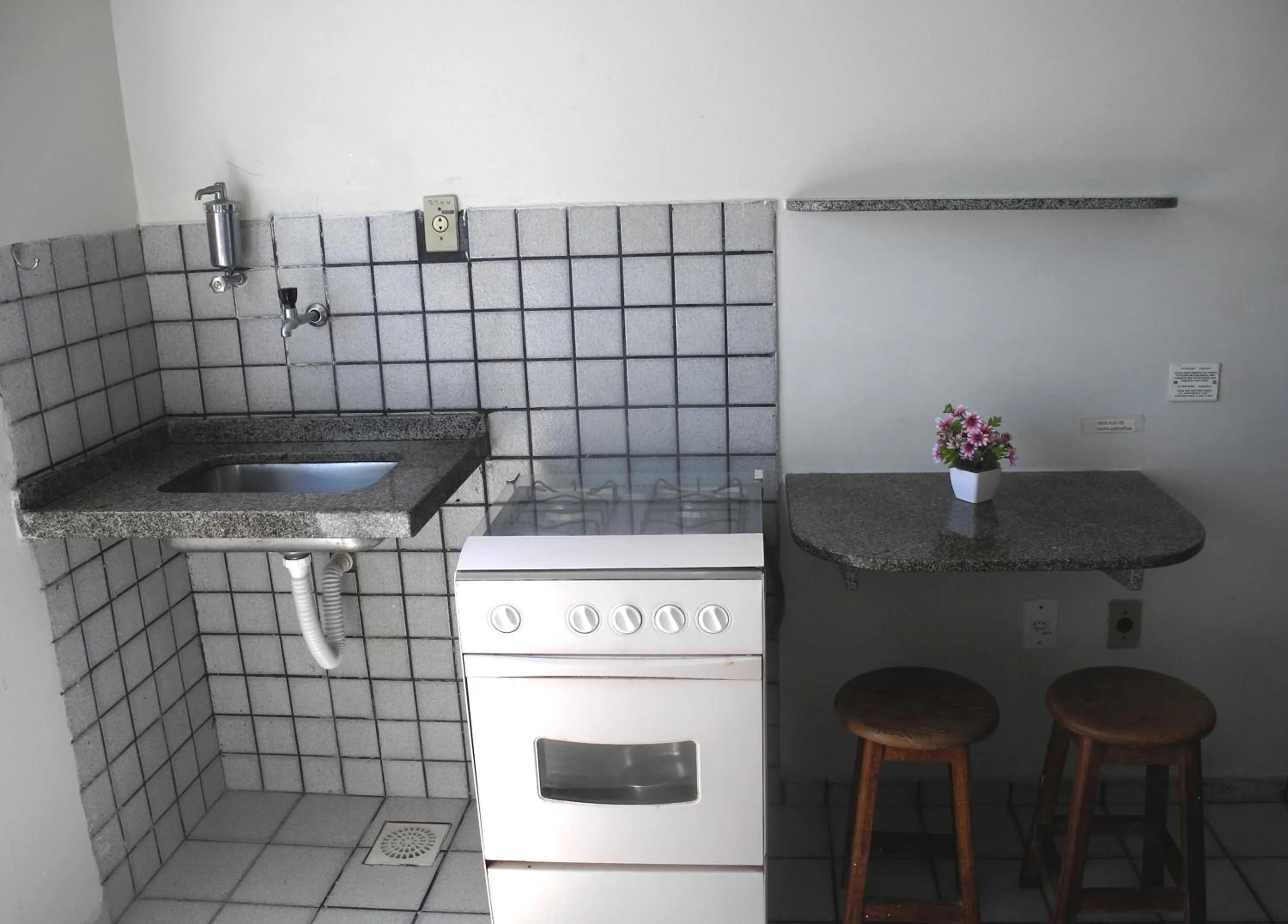 Kitchen or kitchenette in Flat Pousada da Praia