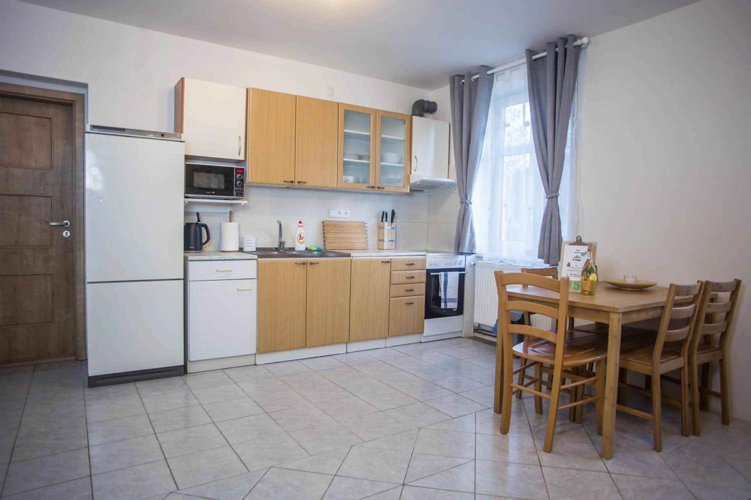 Kitchen or kitchenette in Apartmány Ve Mlejně
