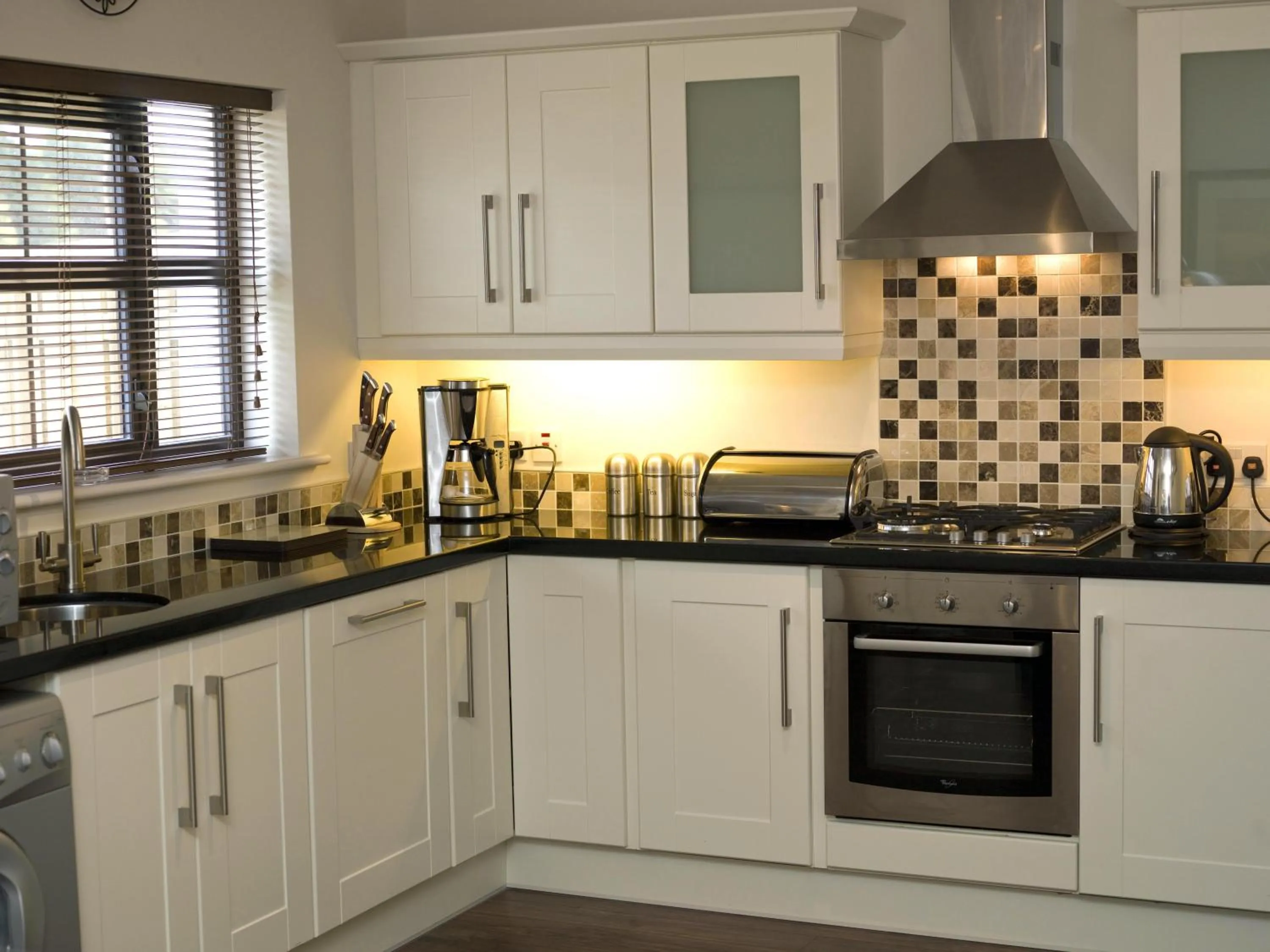Kitchen or kitchenette in Kenmare Bay Hotel Lodges