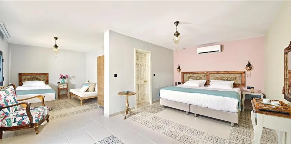 Bed in Fİ Light Solto Boutique Beach Hotel
