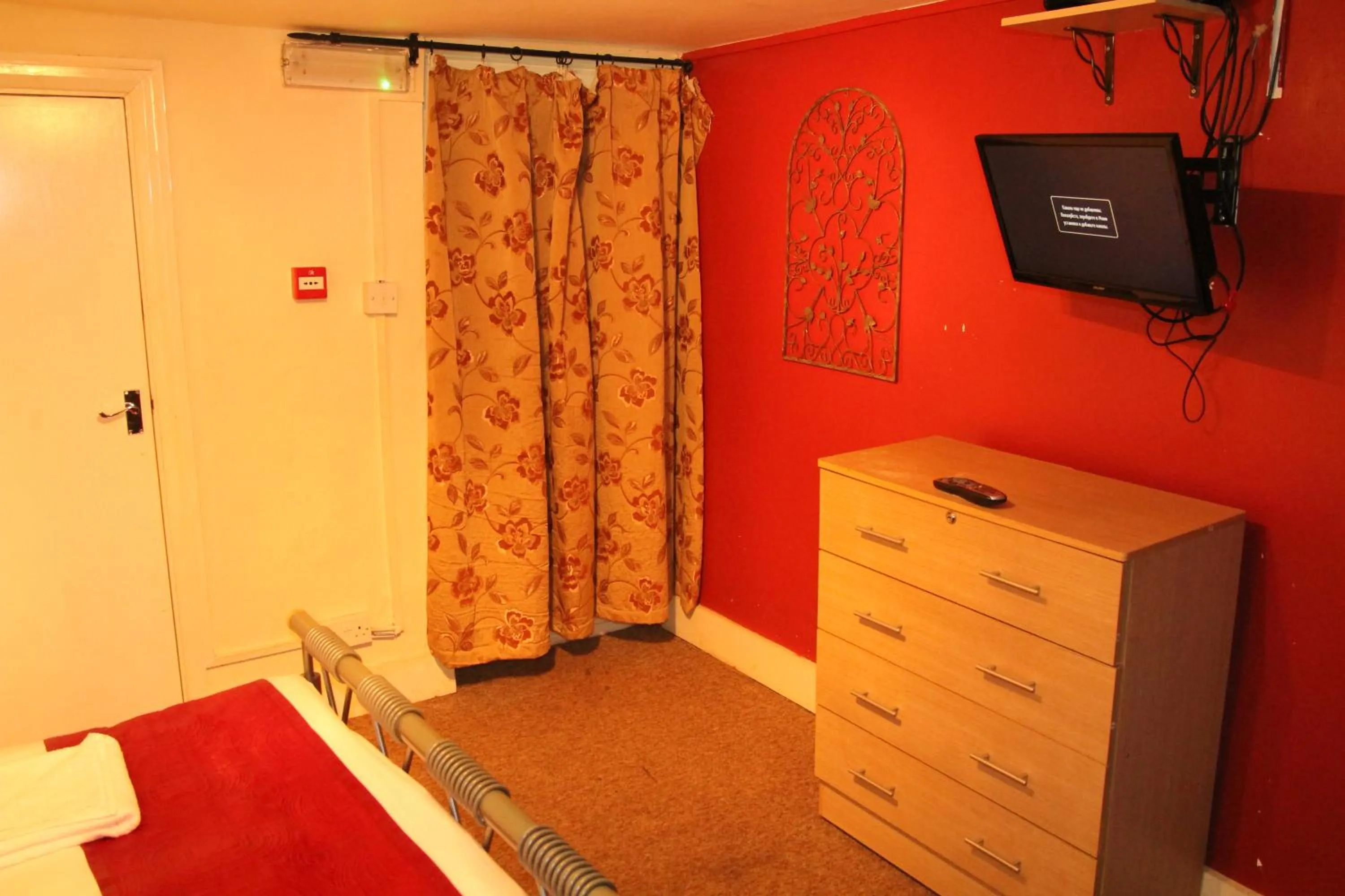 Decorative detail, Bed in London Olympus Hotel Nirvana