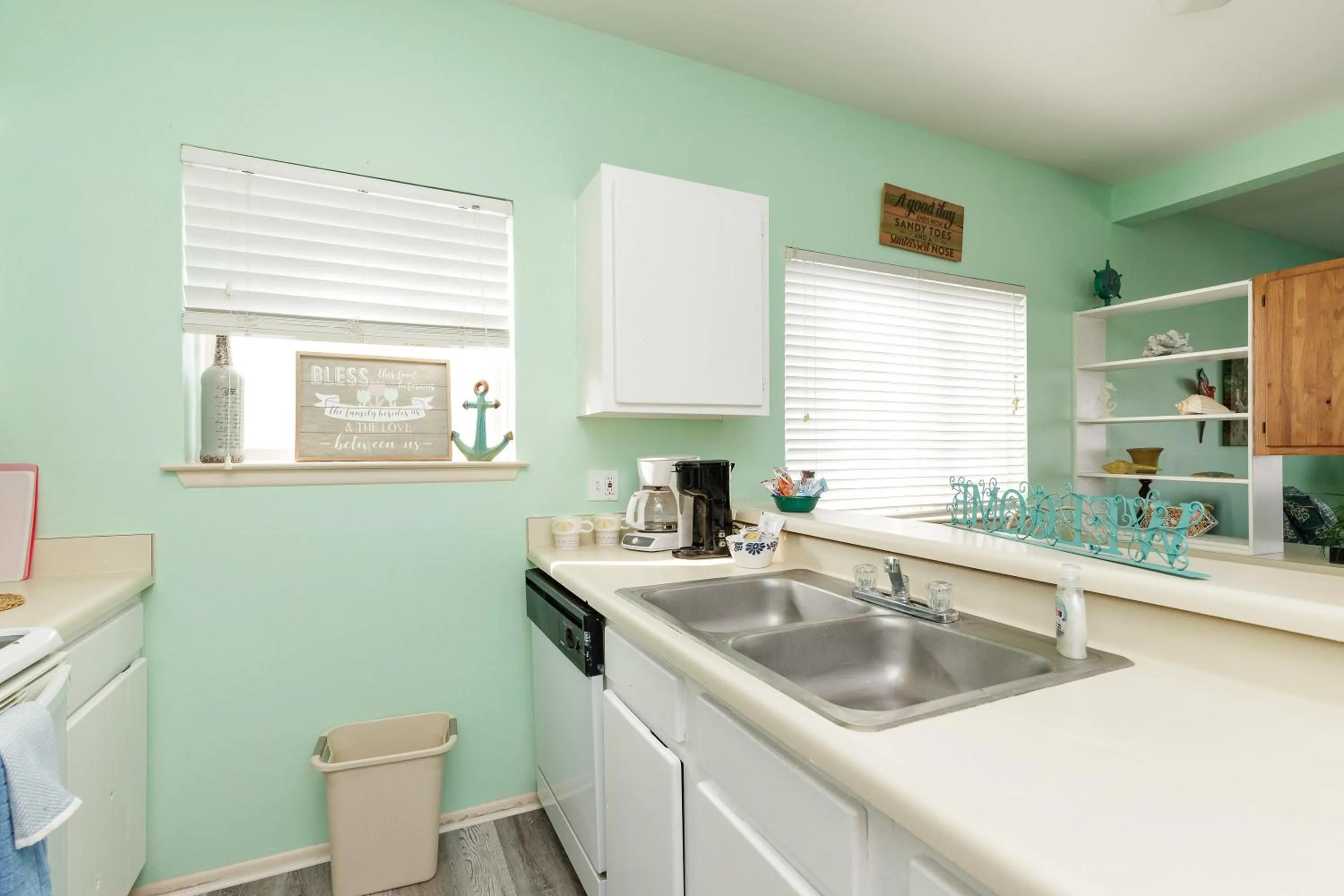 kitchen in Charming family condo - walking distance to beach by Mustang Island, Sleeps Four, 2025 Traveler Award