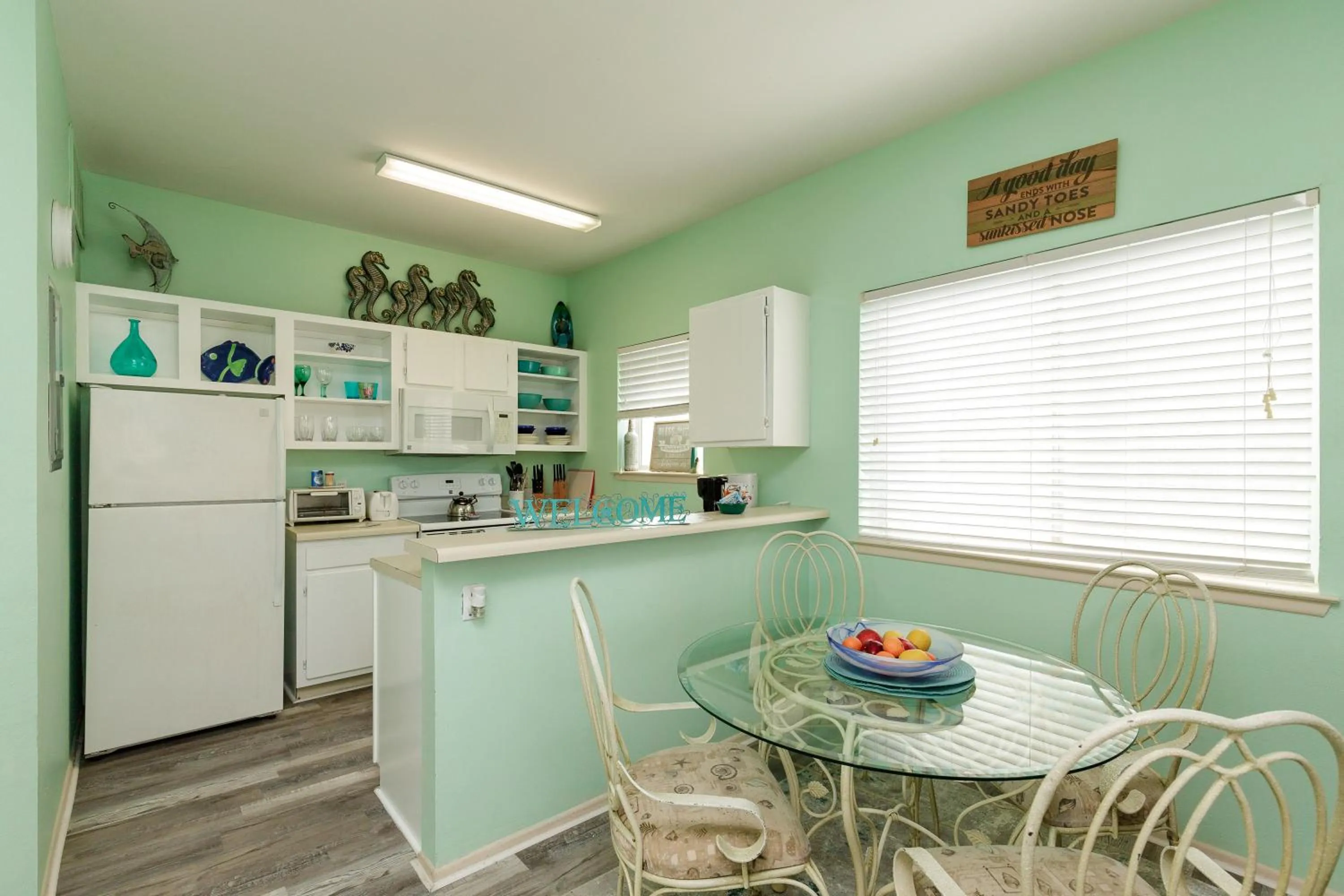 kitchen in Charming family condo - walking distance to beach by Mustang Island, Sleeps Four, 2025 Traveler Award