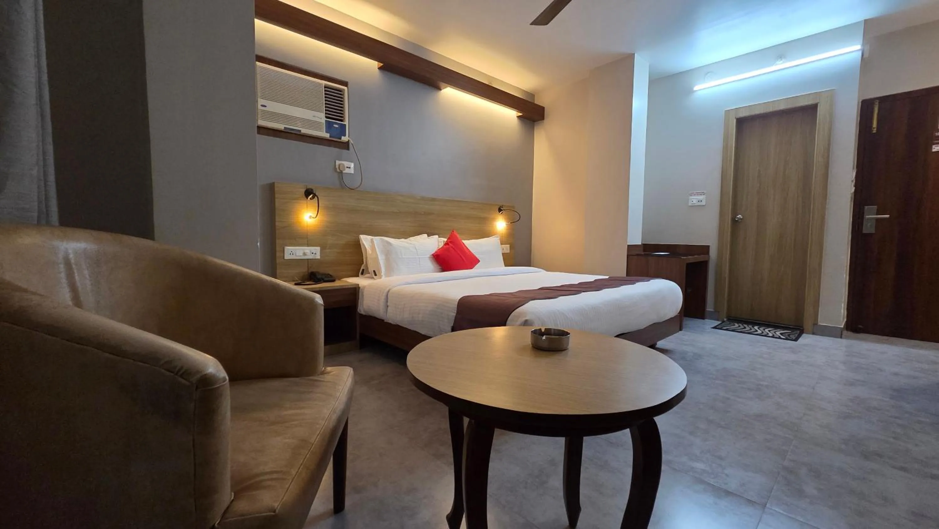 Photo of the whole room, Bed in Hotel Gulmohar Grand