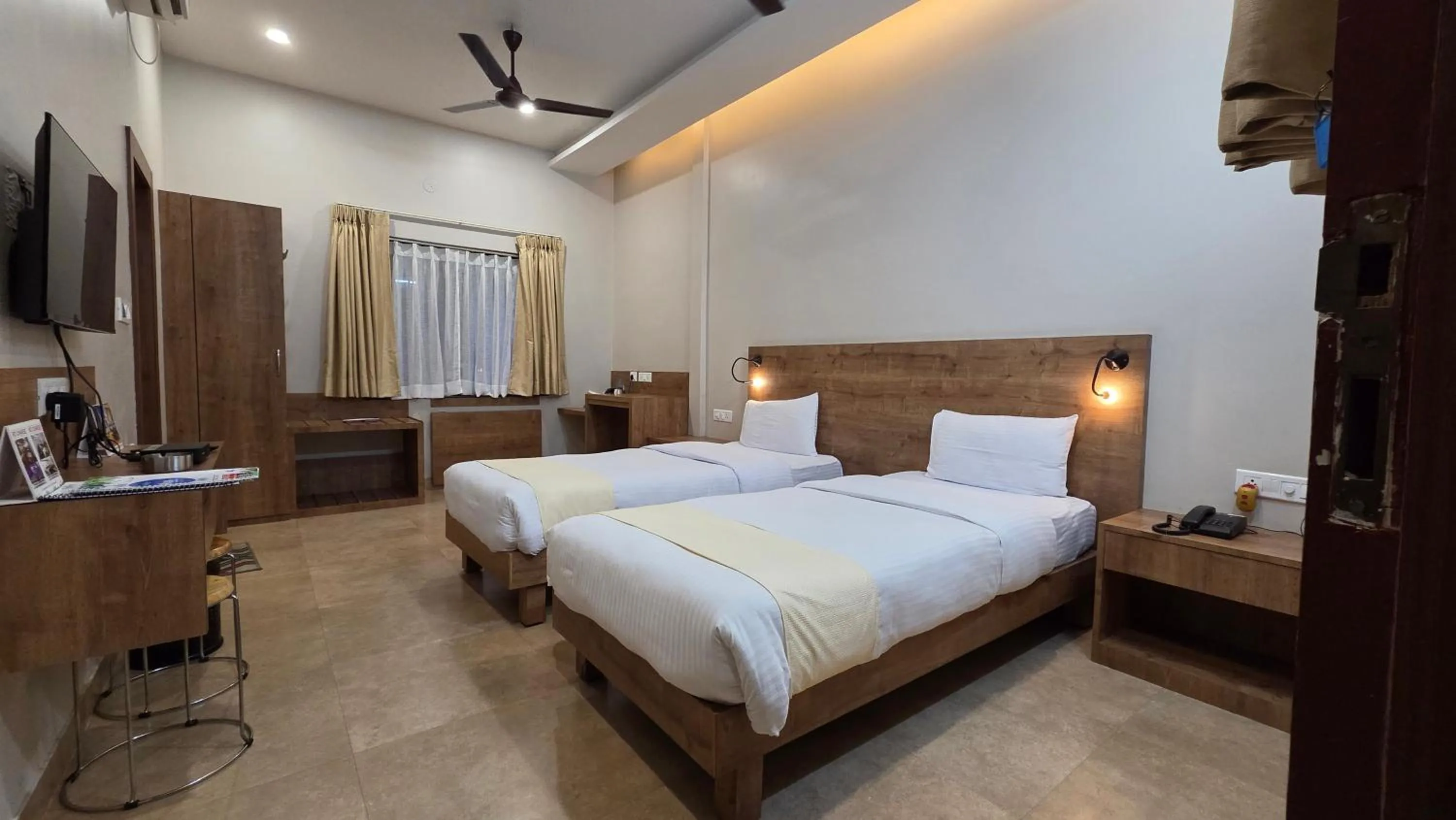 Bed in Hotel Gulmohar Grand
