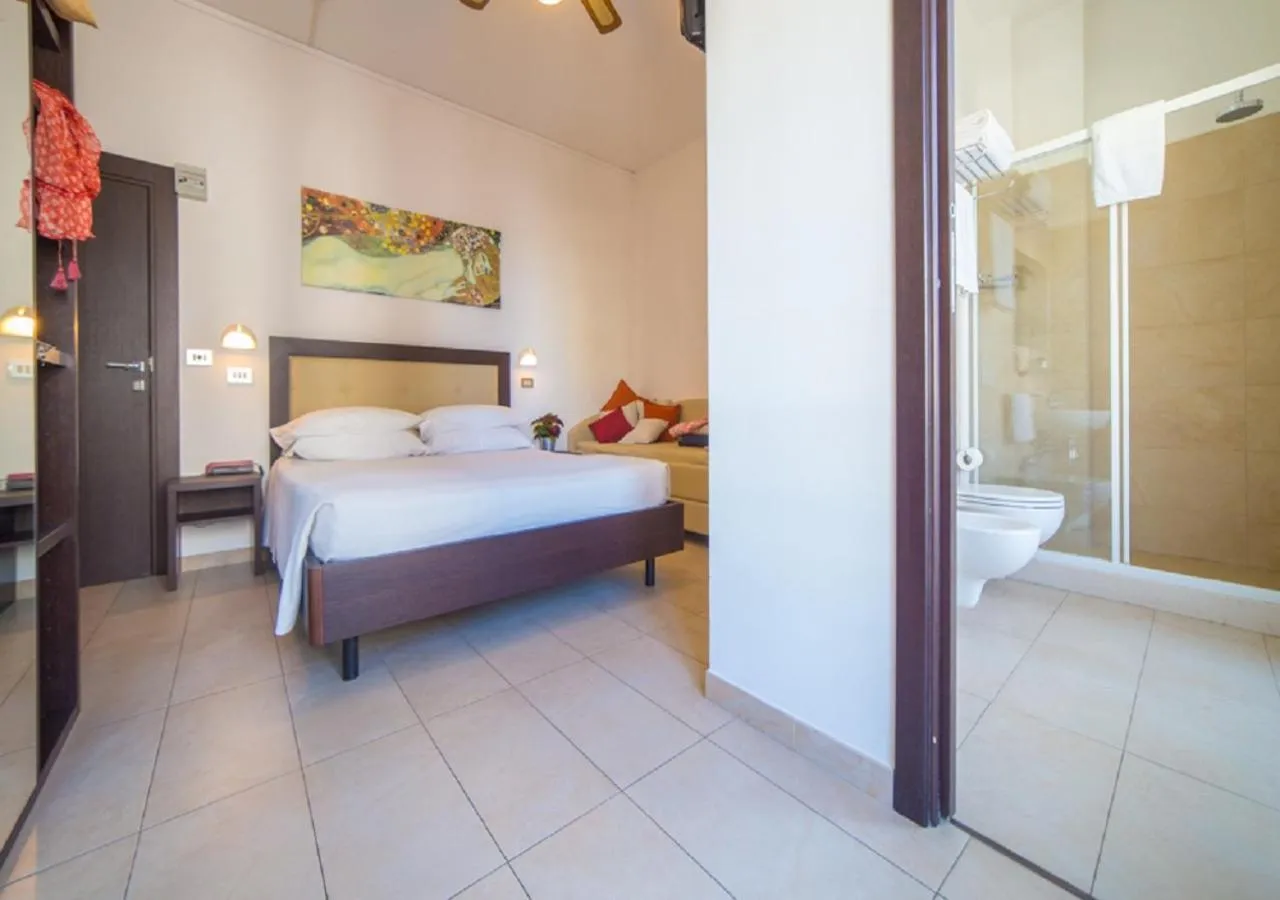 Photo of the whole room, Bed in Mediterraneo Hotel & Suites