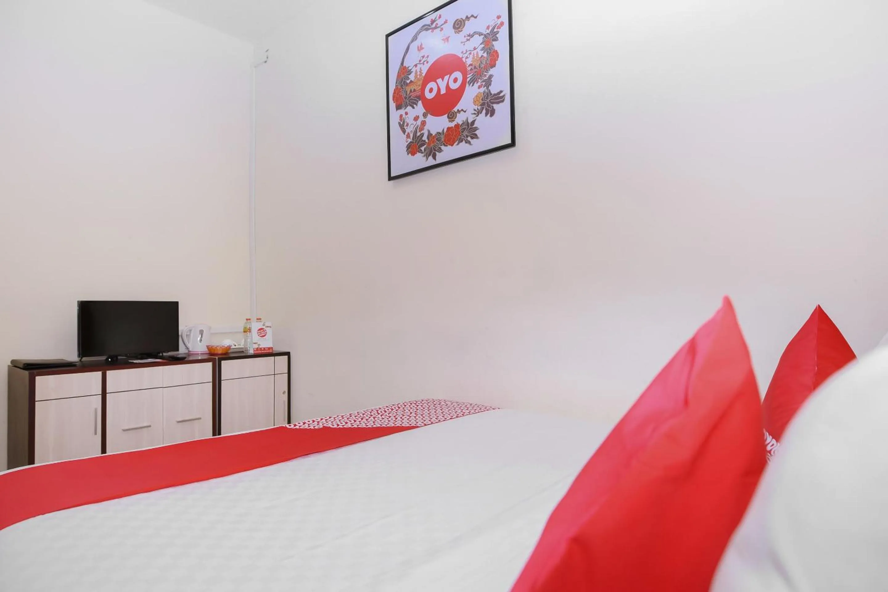 Bedroom in Capital O 854 Ub Caisar Hotel