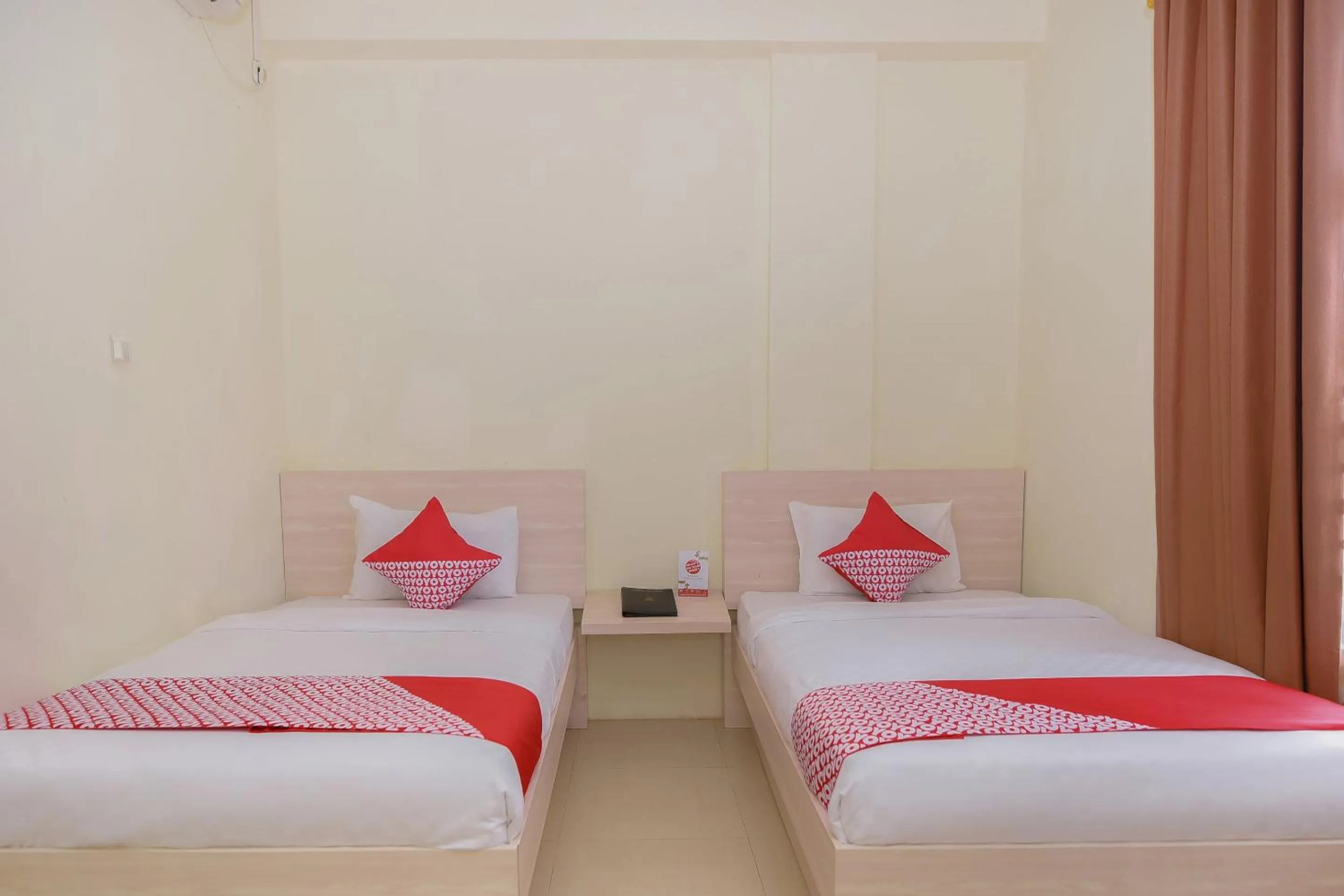 Bedroom in Capital O 854 Ub Caisar Hotel