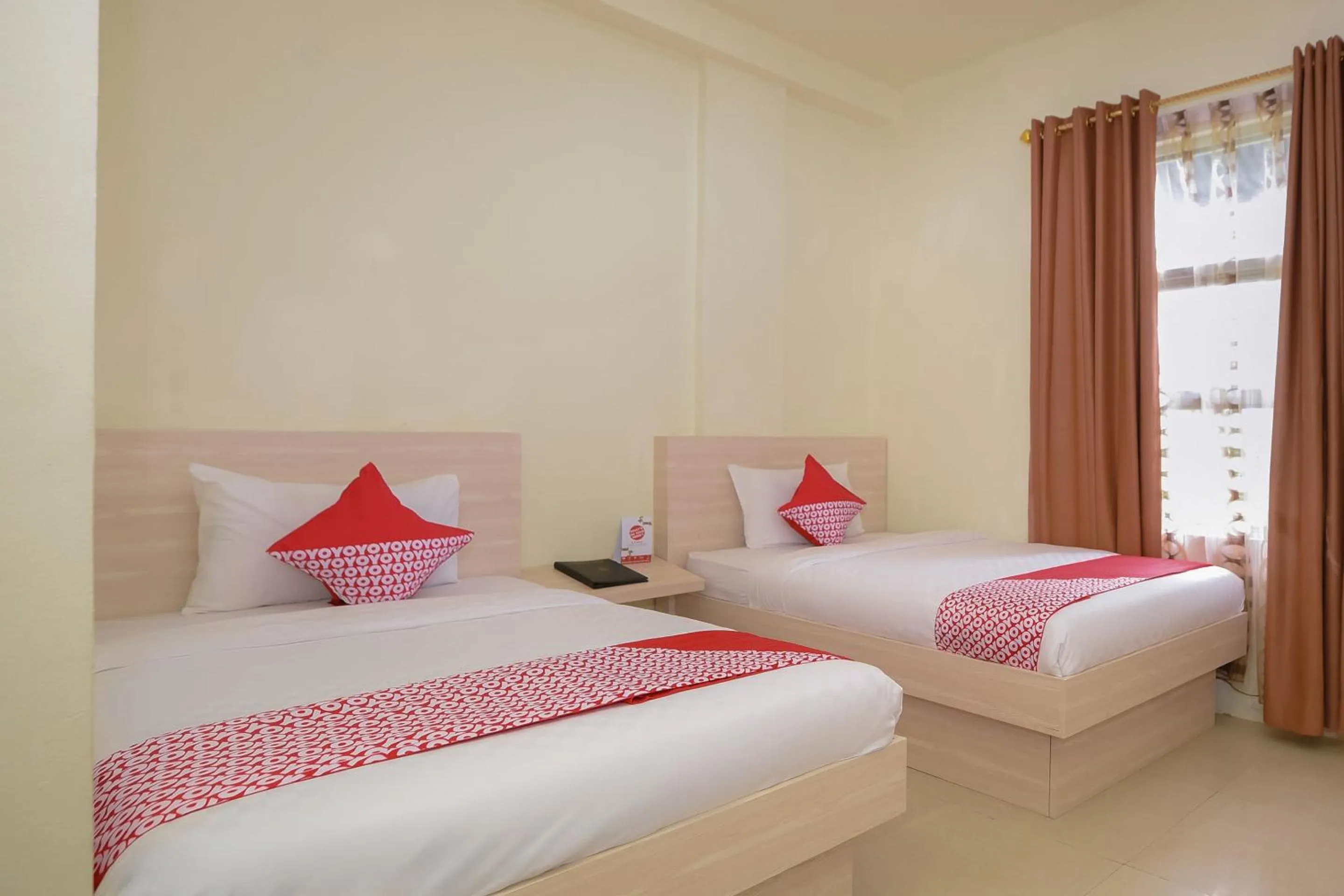 Bedroom in Capital O 854 Ub Caisar Hotel