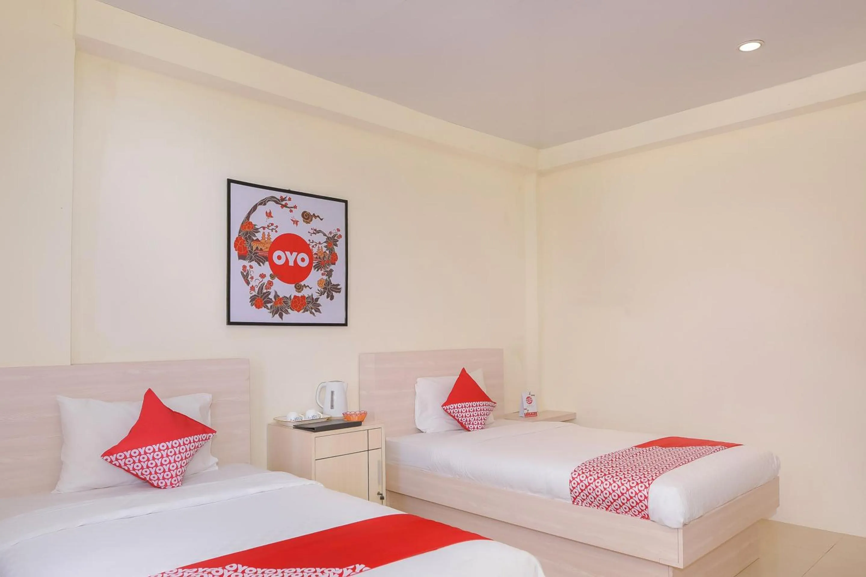 Bedroom in Capital O 854 Ub Caisar Hotel