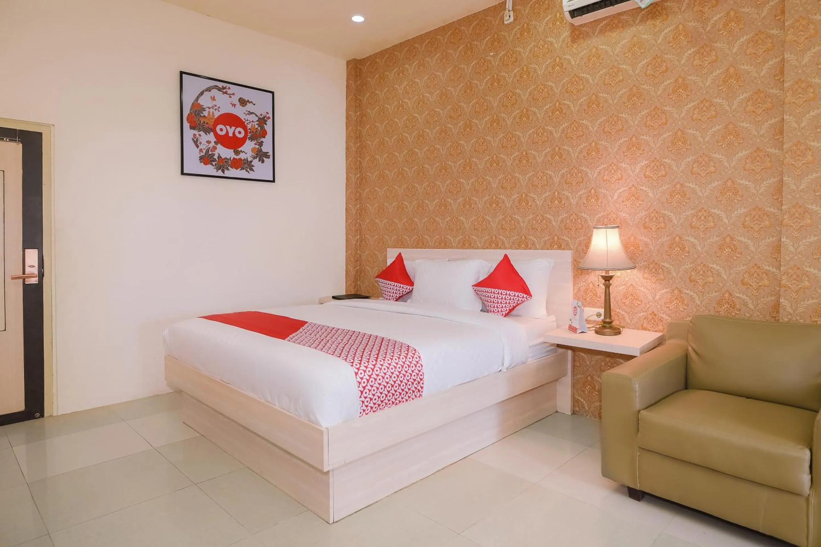 Bedroom in Capital O 854 Ub Caisar Hotel