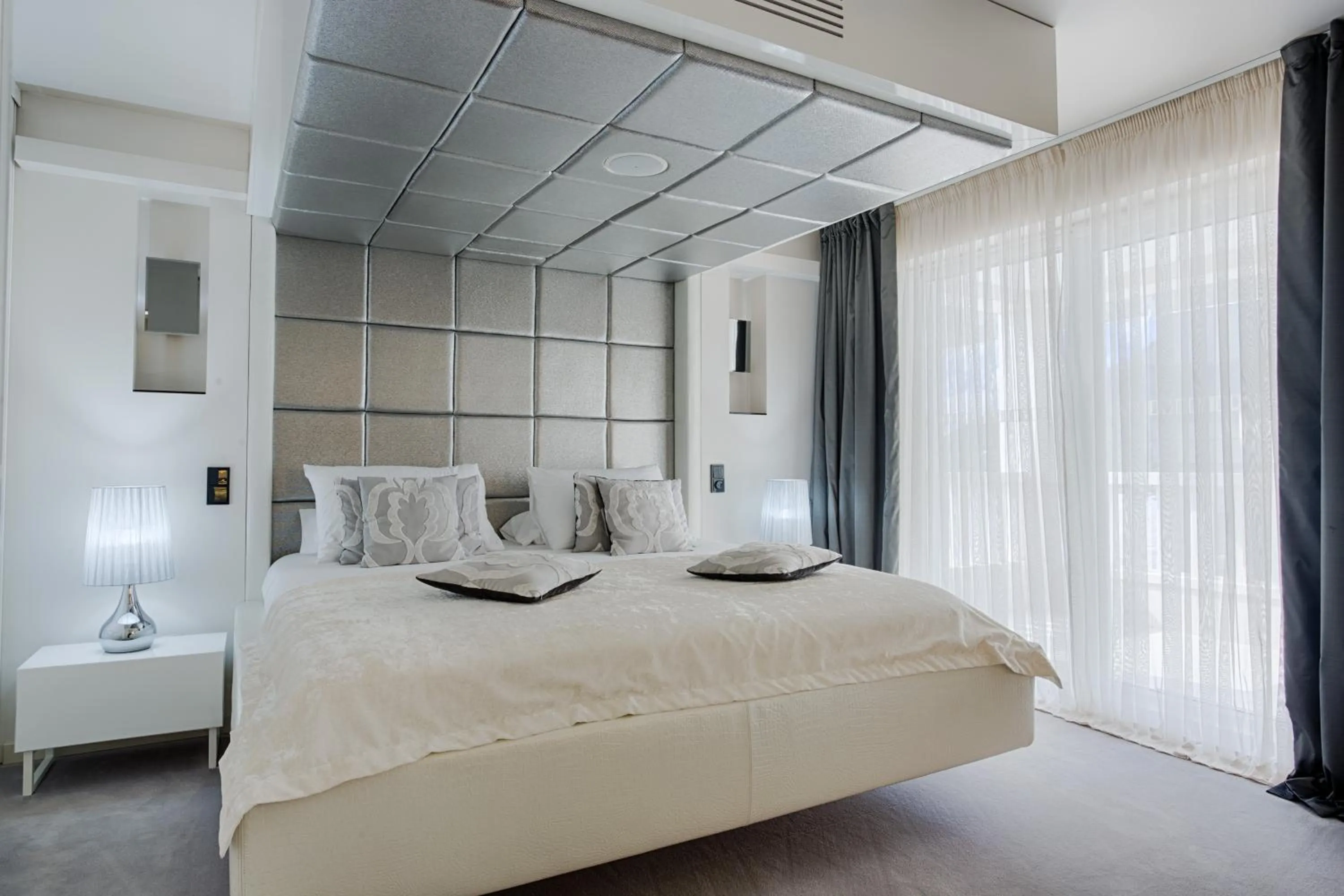 Bed in Damianii Luxury Boutique Hotel & Spa