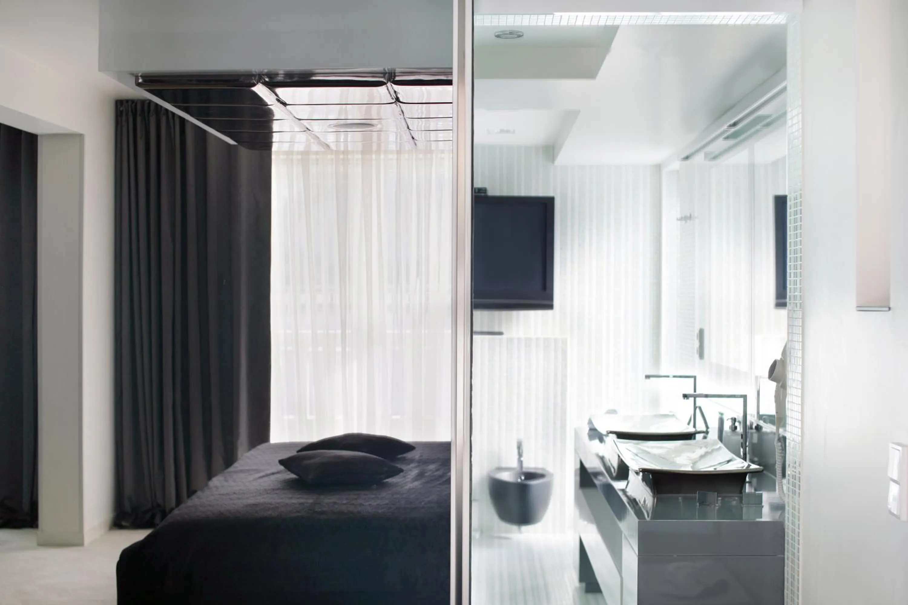 Communal lounge/ TV room, Bed in Damianii Luxury Boutique Hotel & Spa