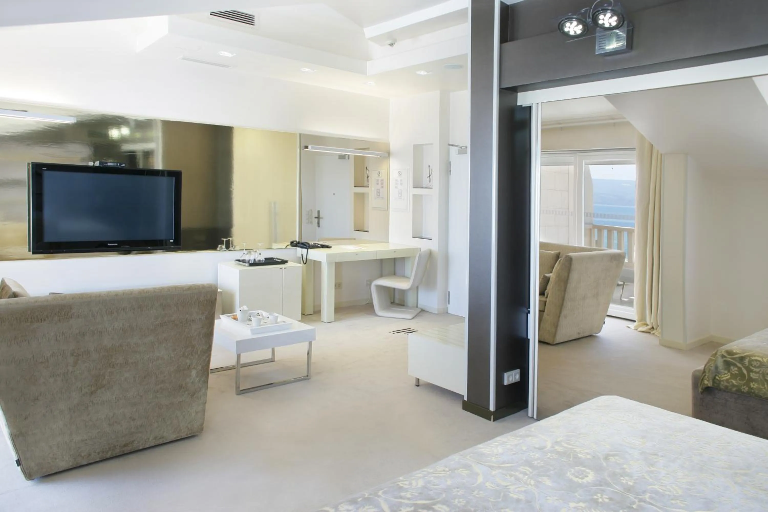 Communal lounge/ TV room, Bed in Damianii Luxury Boutique Hotel & Spa