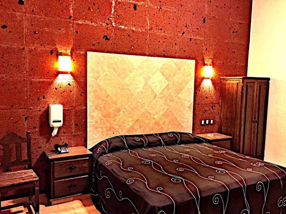 Quadruple Room with Garden View in Hotel & Motel Hacienda Jiutepec
