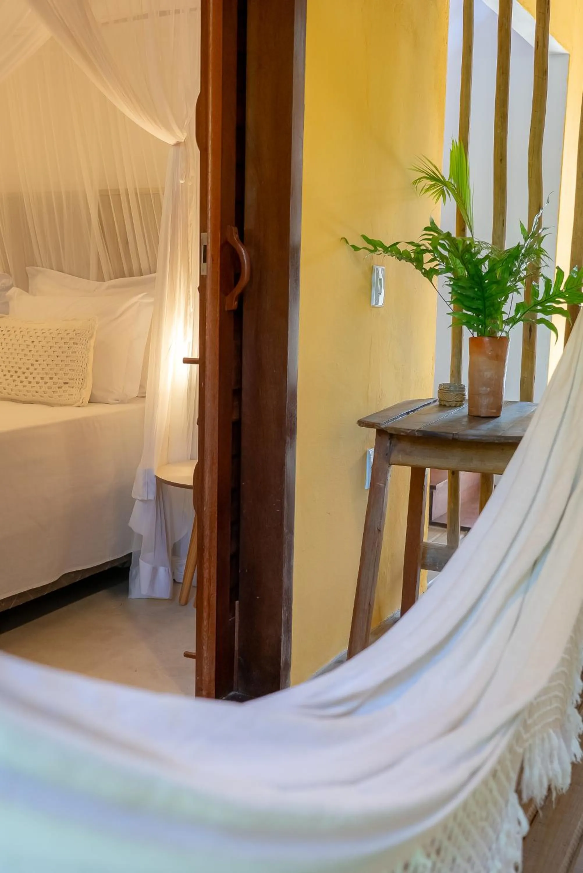 Photo of the whole room, Bed in Pousada Por do Sol Trancoso