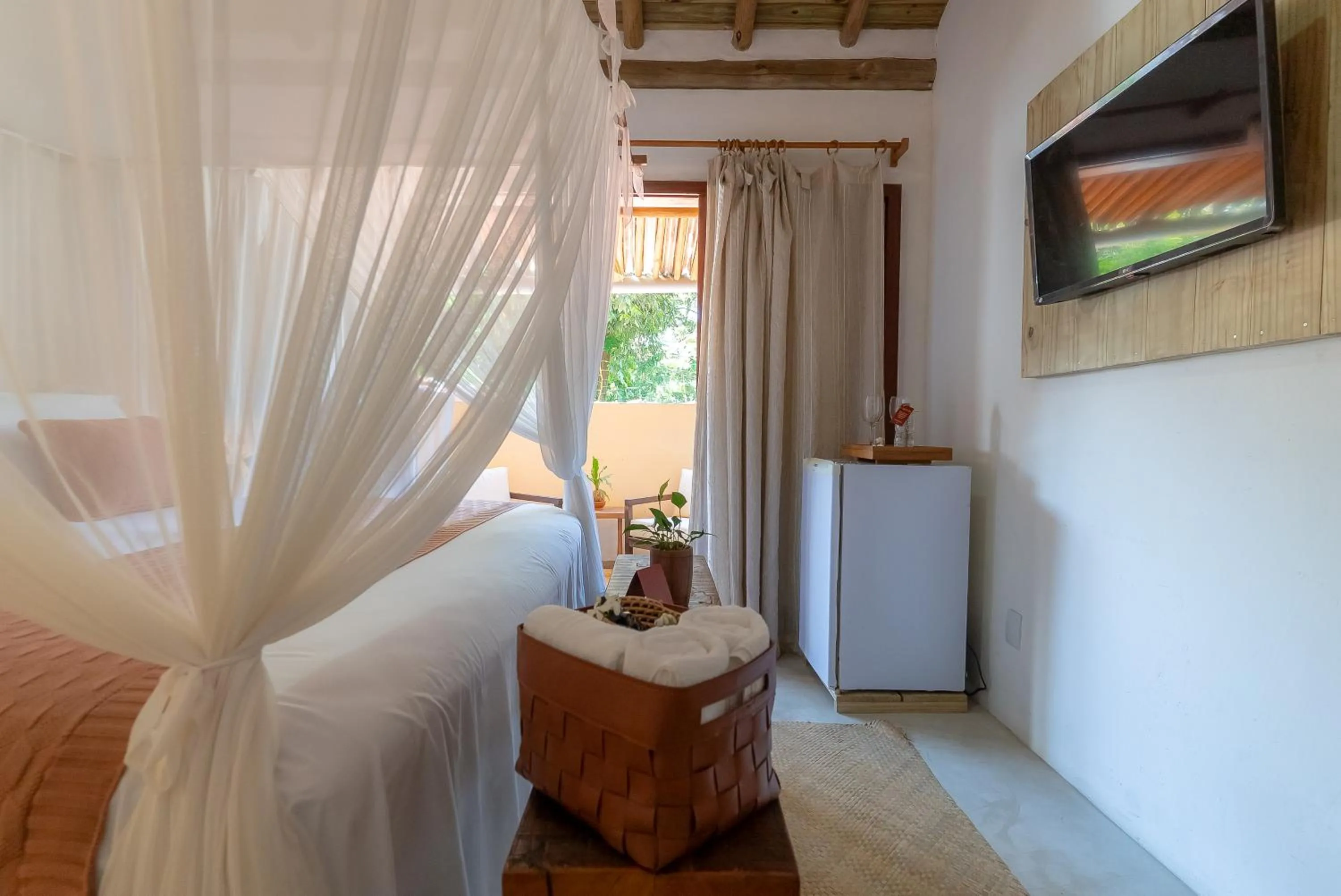 Bed in Pousada Por do Sol Trancoso