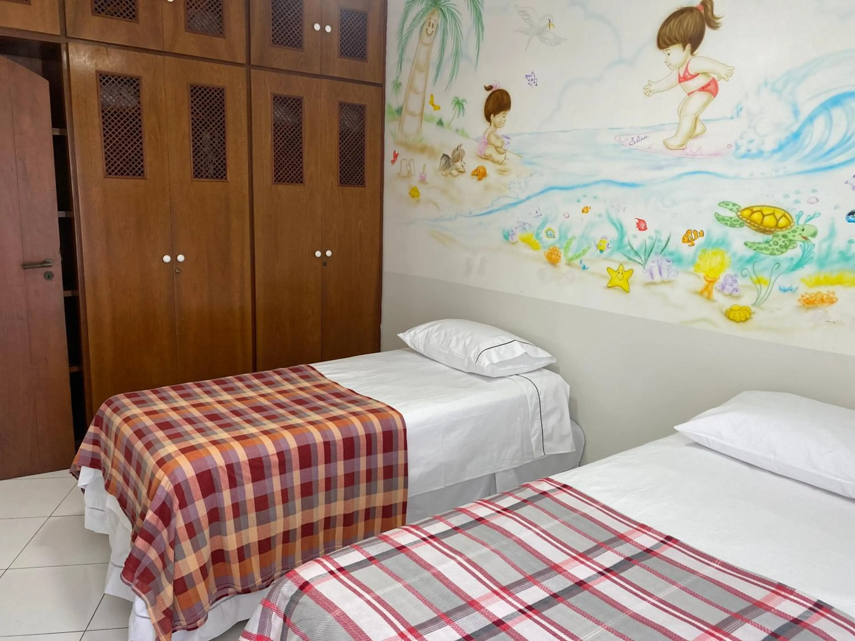 Bedroom, Bed in Apto praia do Tombo - Guarujá