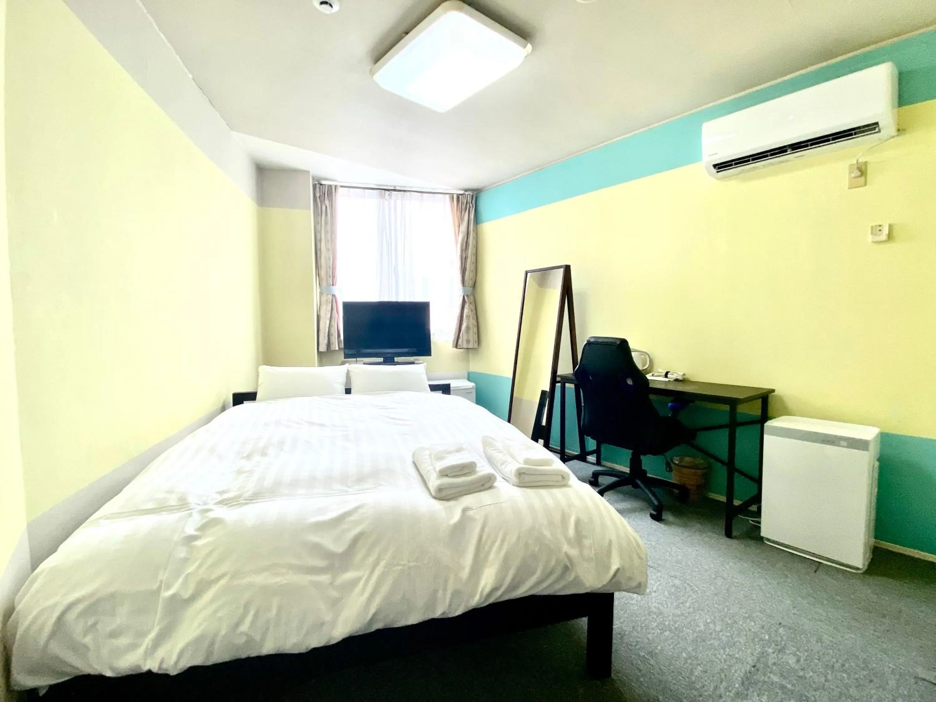 Bed in HendaKara Hotel