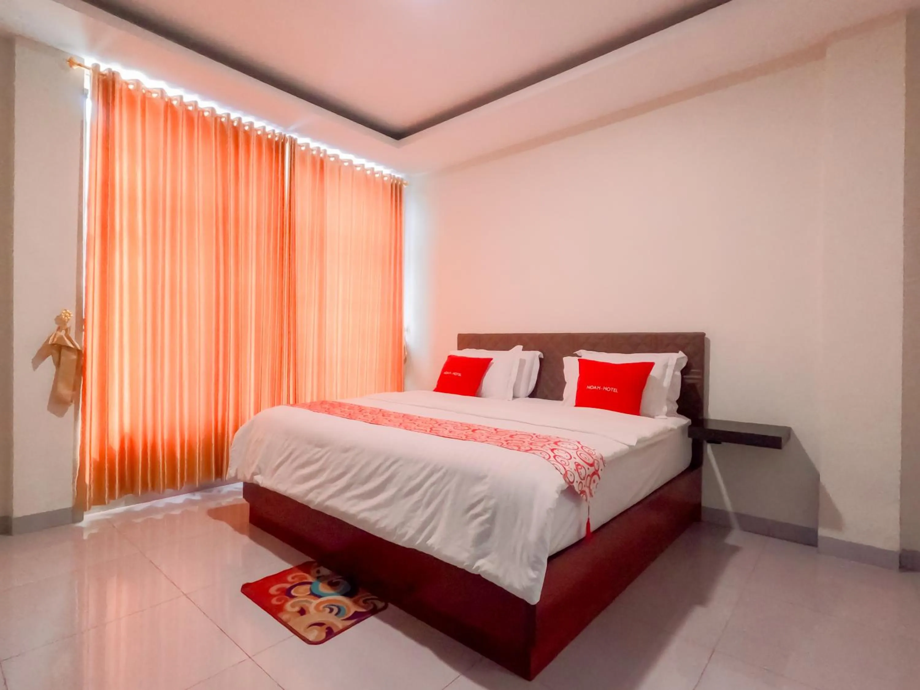 Bed in Noah Hotel Silangit