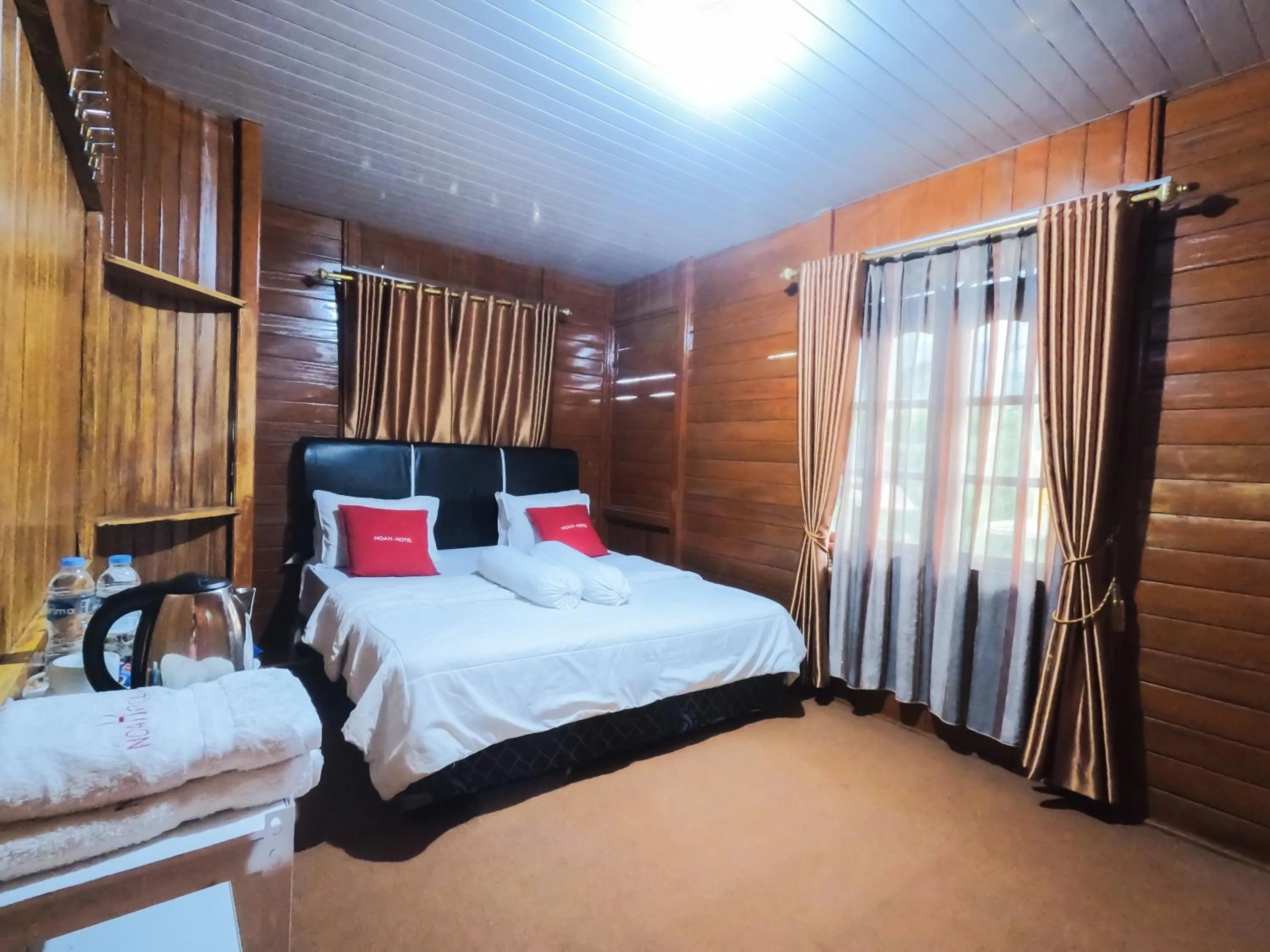 Bed in Noah Hotel Silangit