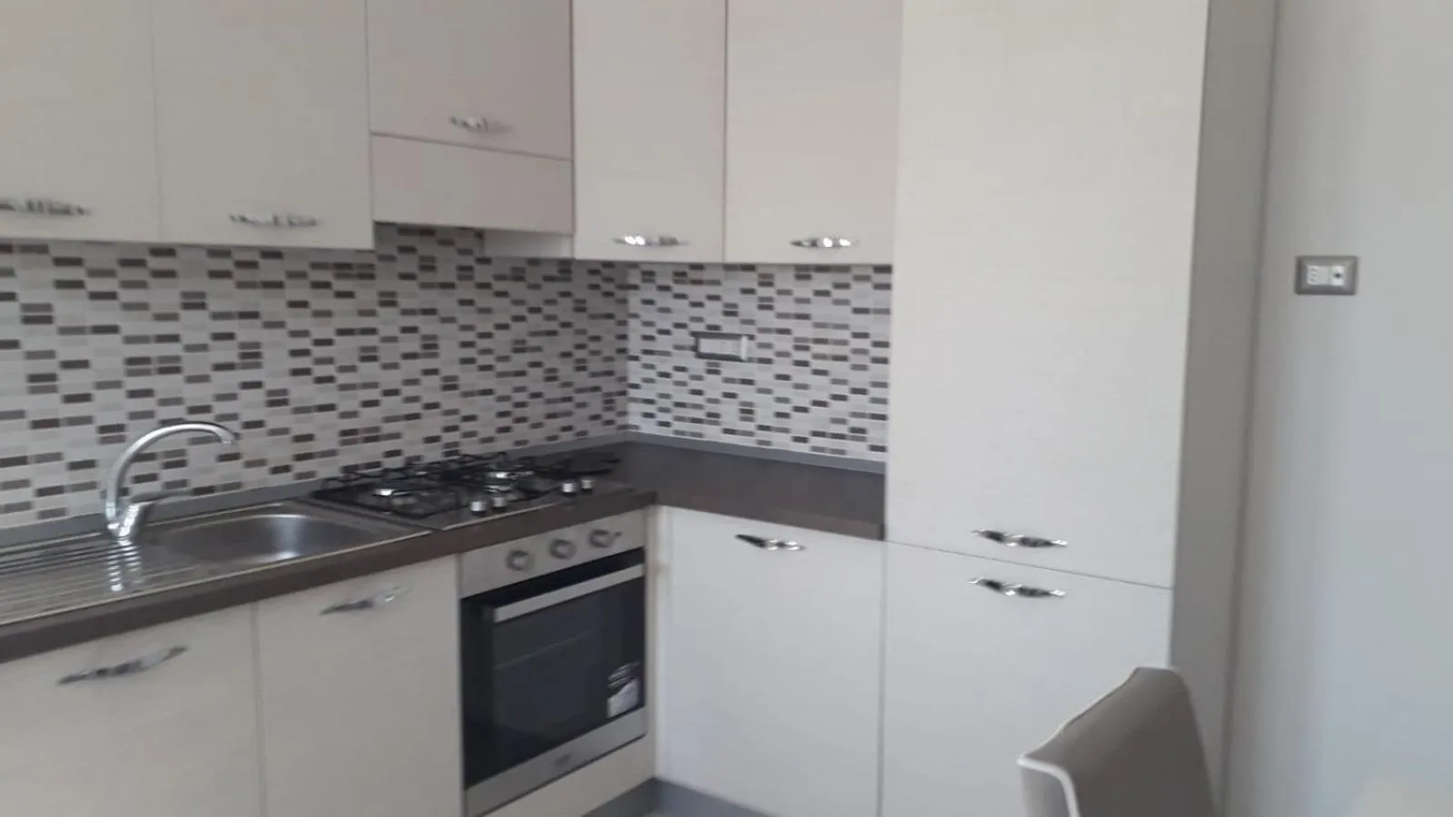 Kitchen or kitchenette in Appartamento B&B Domus Pompei