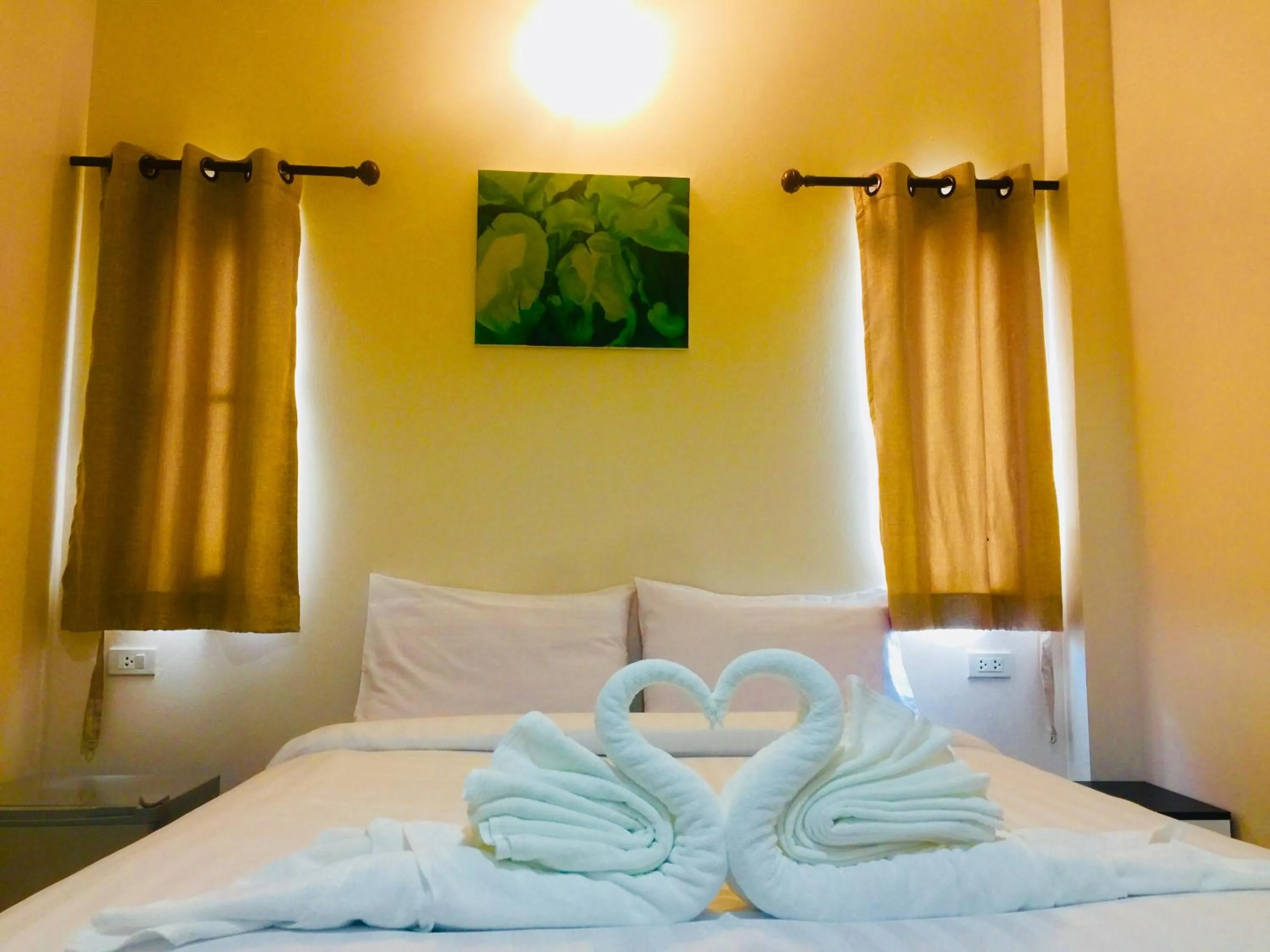 Bed in DE ROSE Hotel Chiang Mai