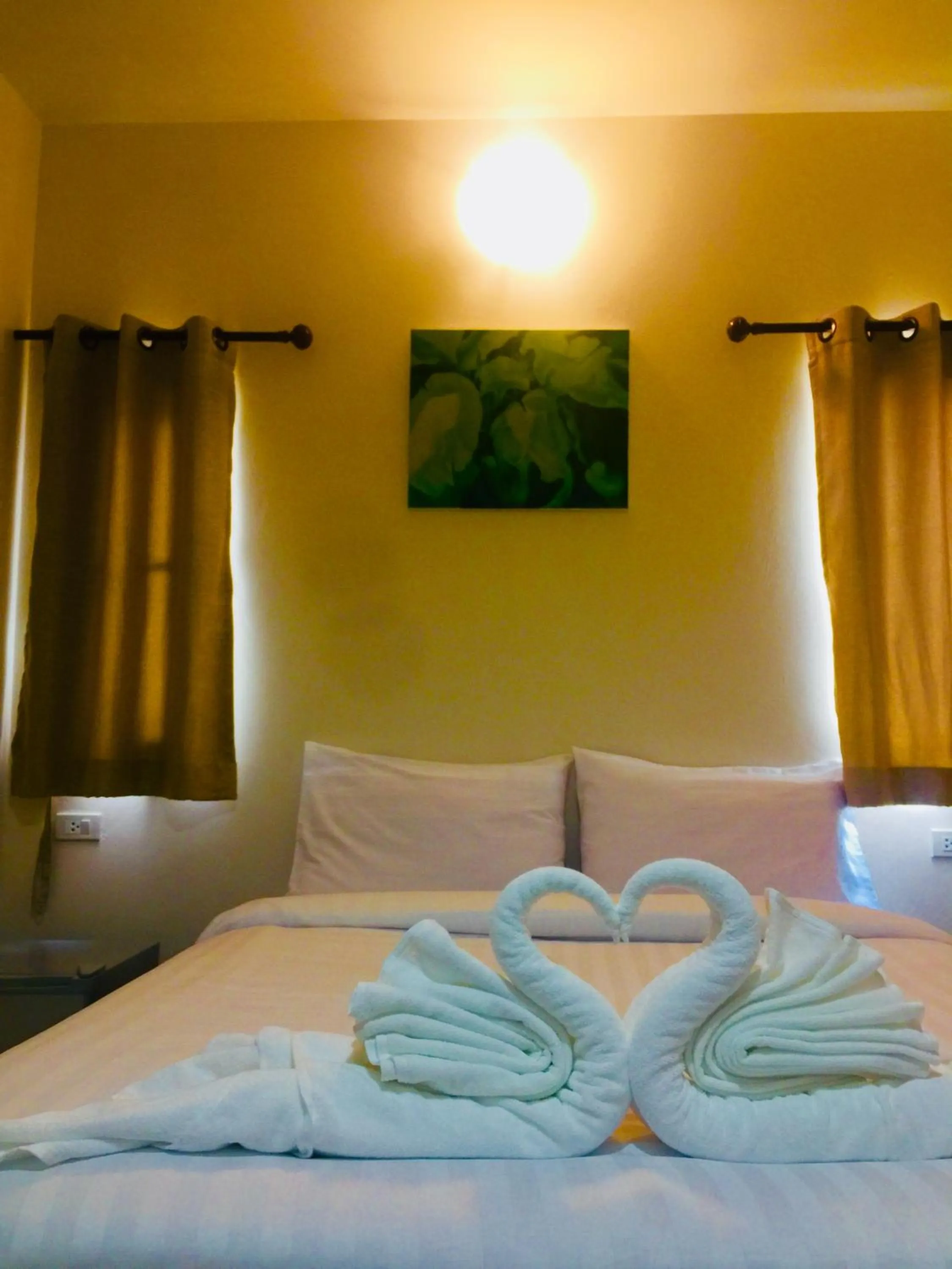 Photo of the whole room, Bed in DE ROSE Hotel Chiang Mai