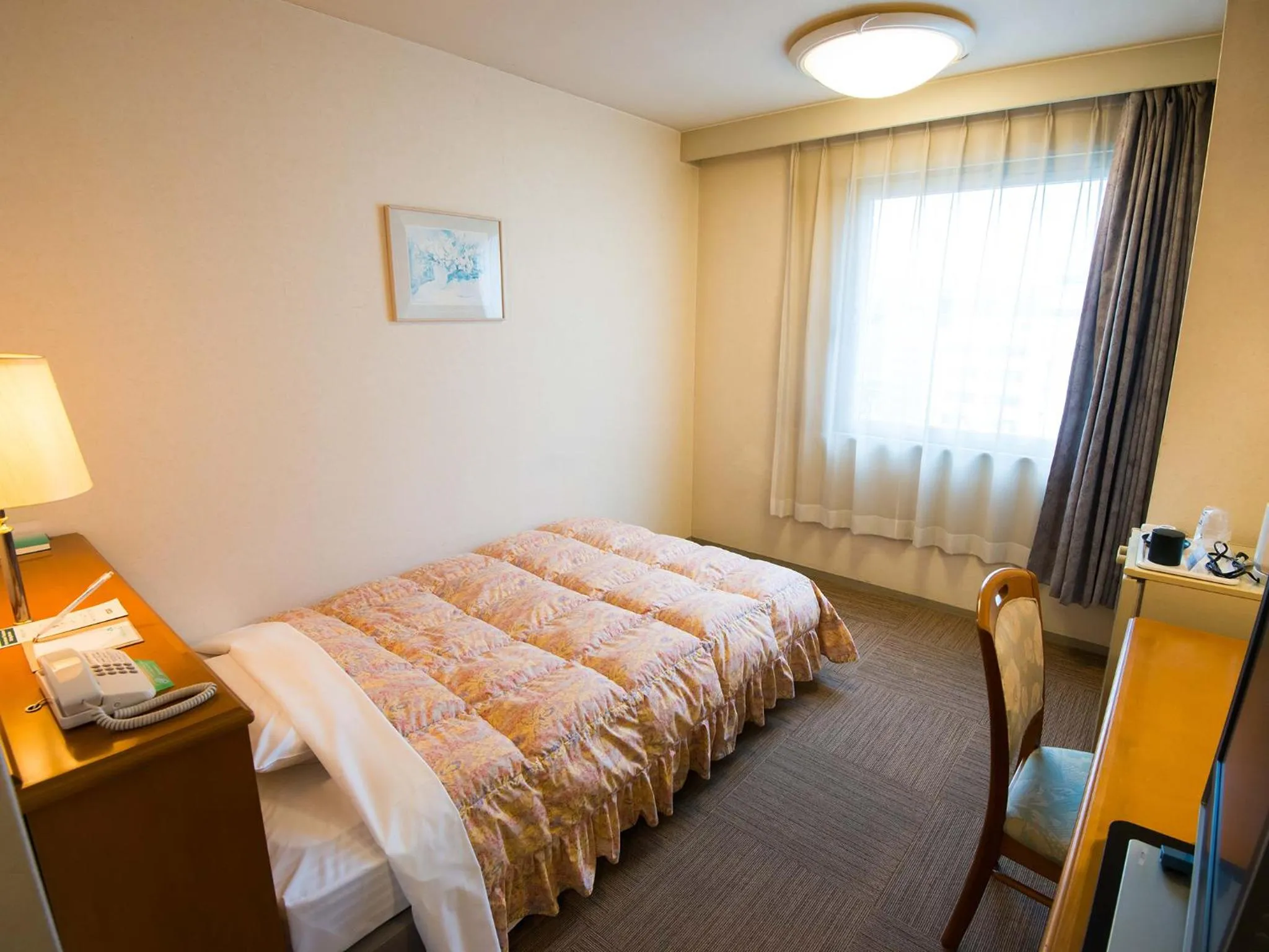 Bed in Kashihara Royal Hotel