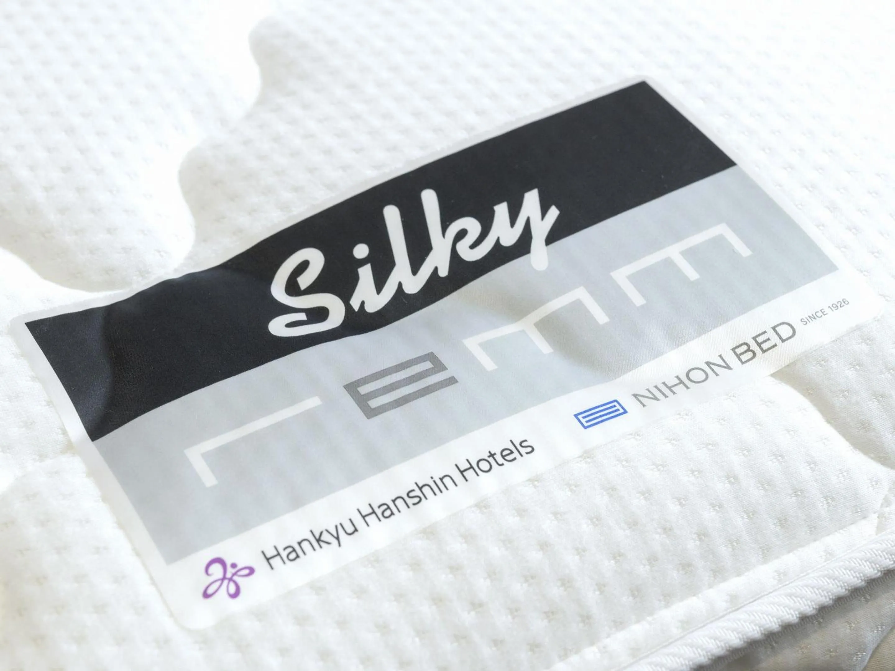 Bed in remm Shin-Osaka