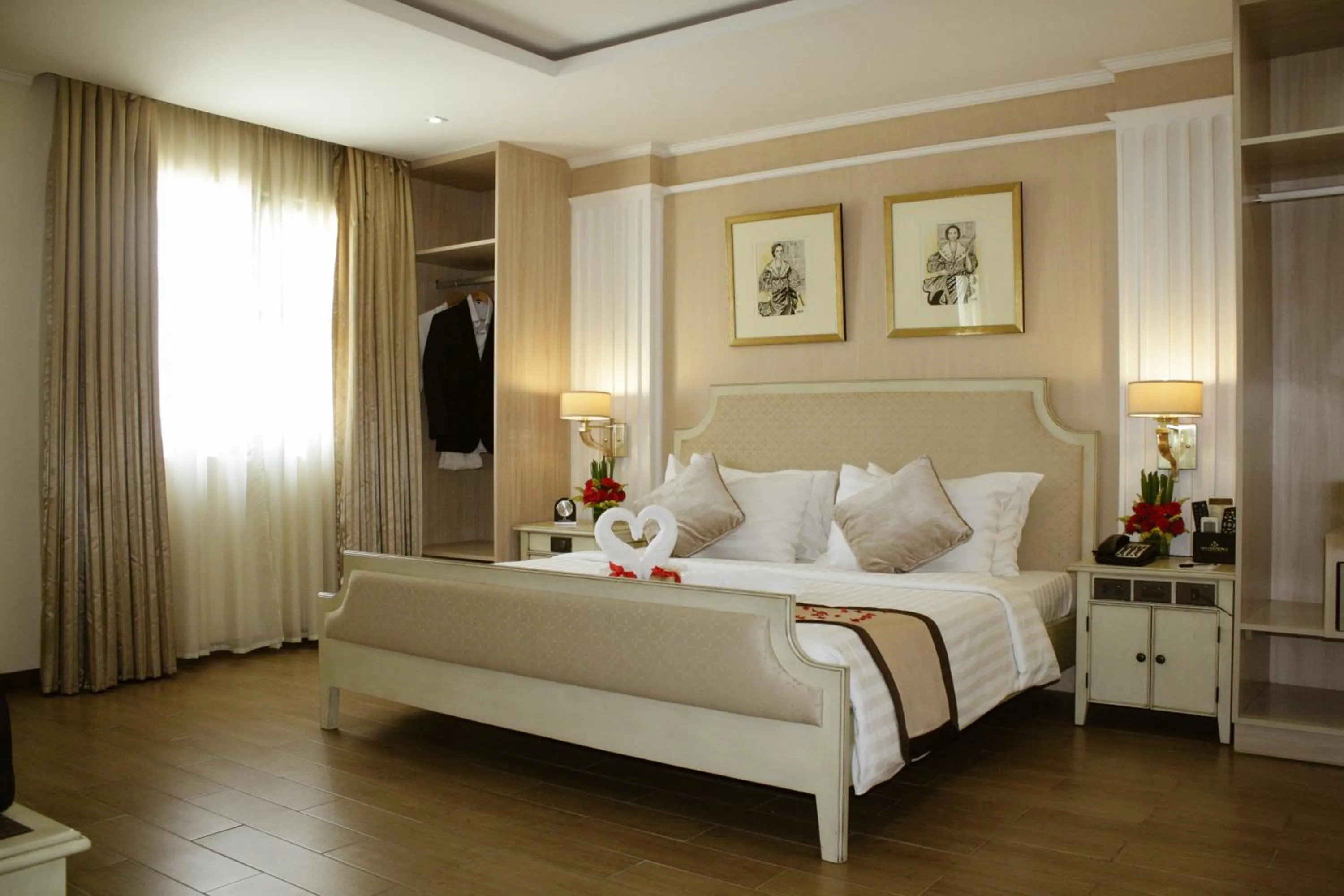 Bed in Golden Prince Hotel & Suites