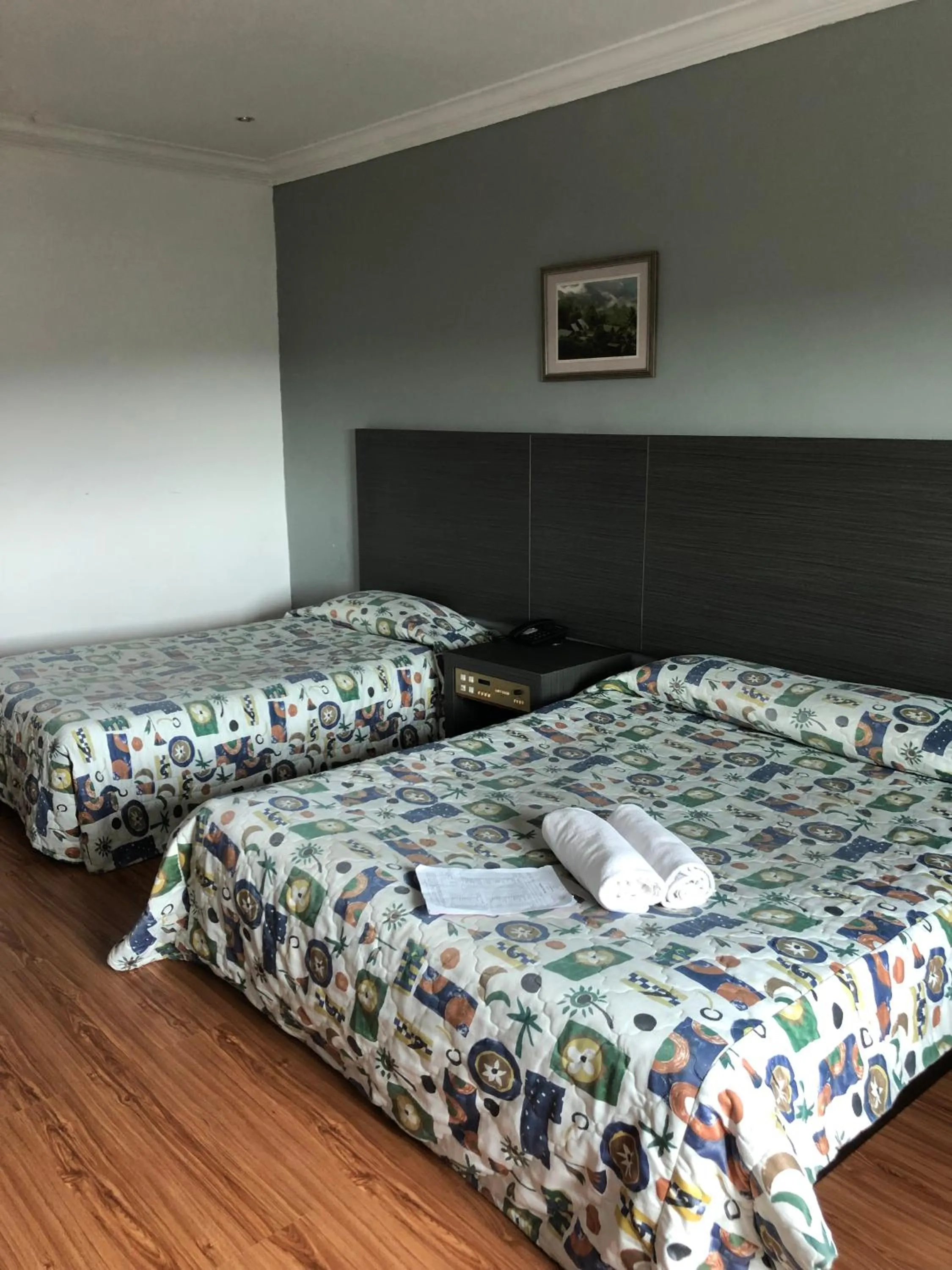 Bed in Purnama Hotel