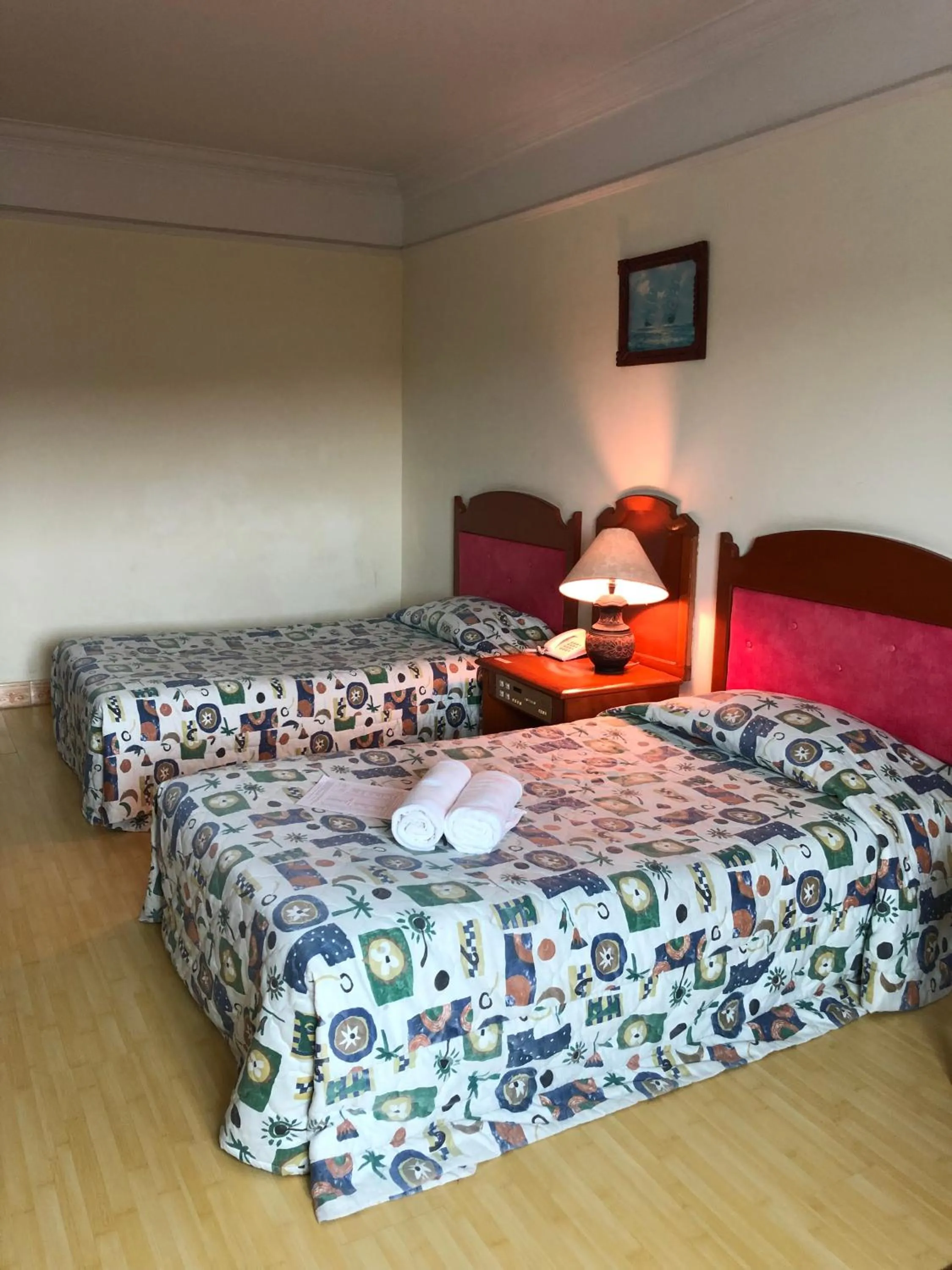 Bed in Purnama Hotel